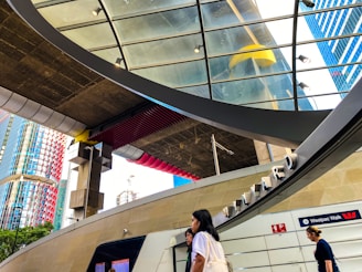 A group of people walking up and down a set of stairs