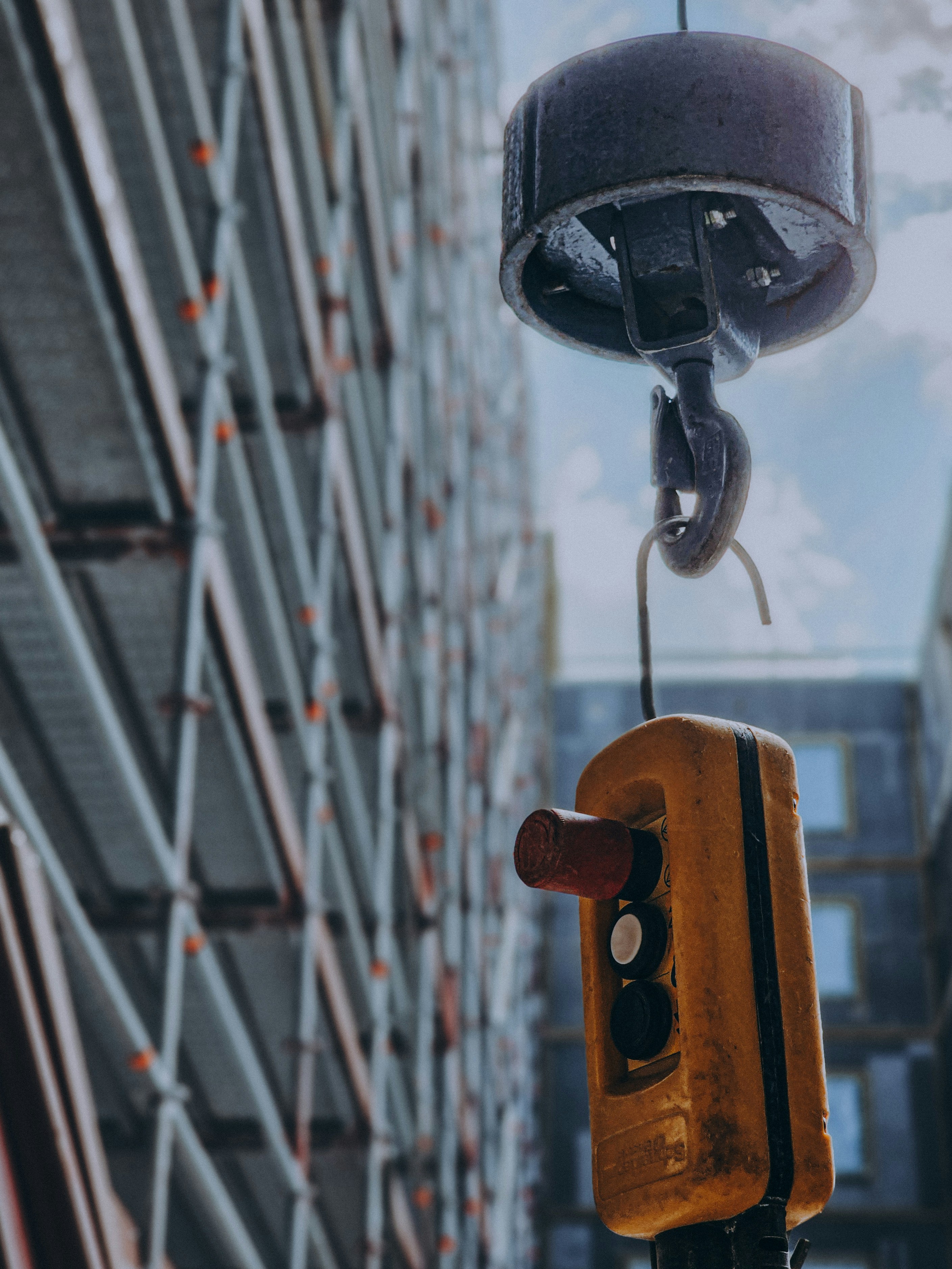 A traffic light hanging from the side of a building