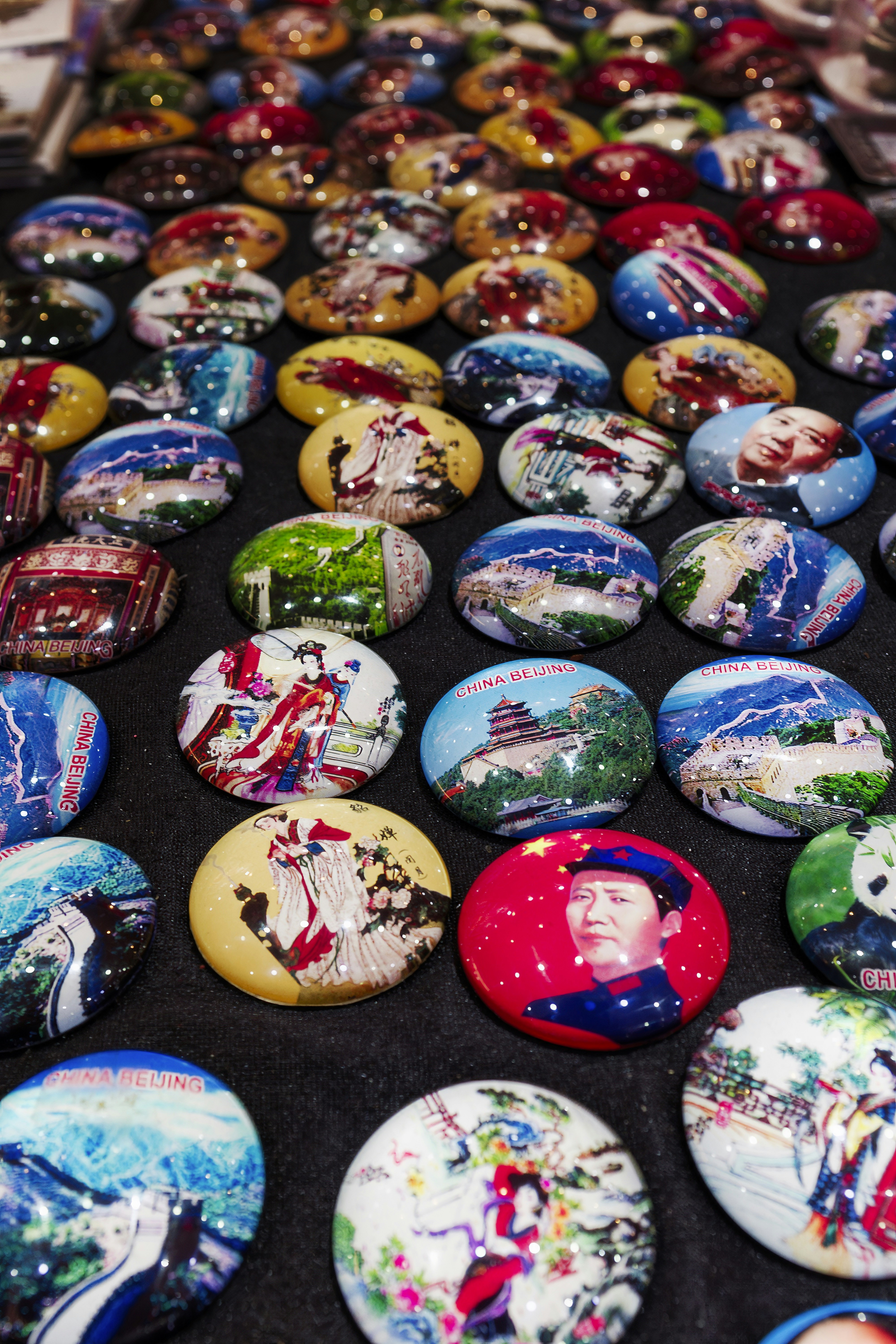 A table topped with lots of different colored buttons