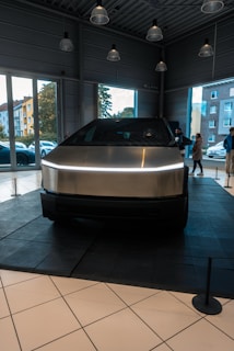A car is on display in a building