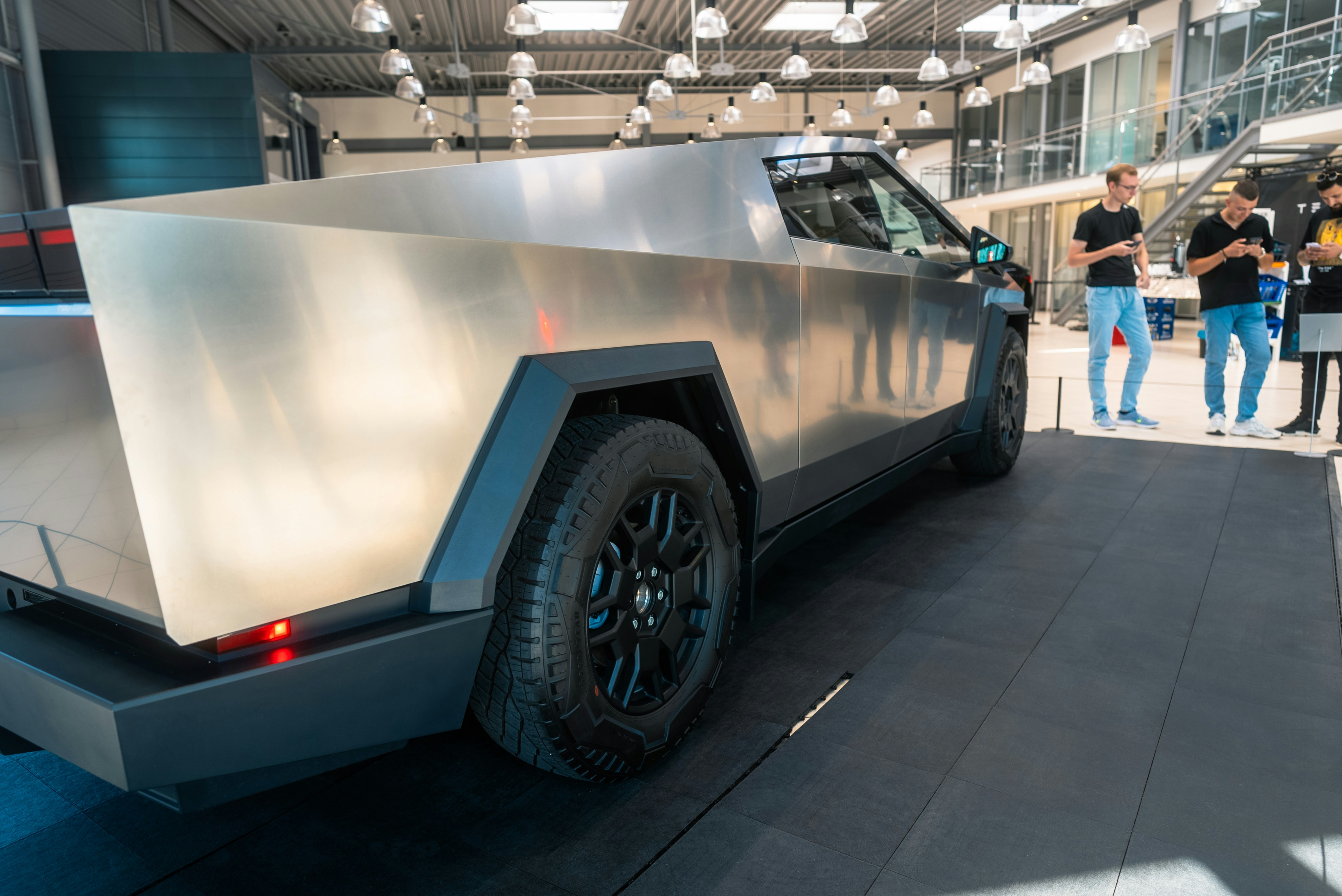 A futuristic vehicle is parked in a building
