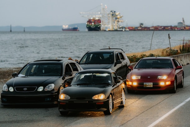 A group of cars that are sitting in the street