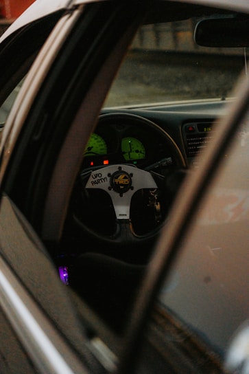 A view of a car's dashboard from the driver's seat
