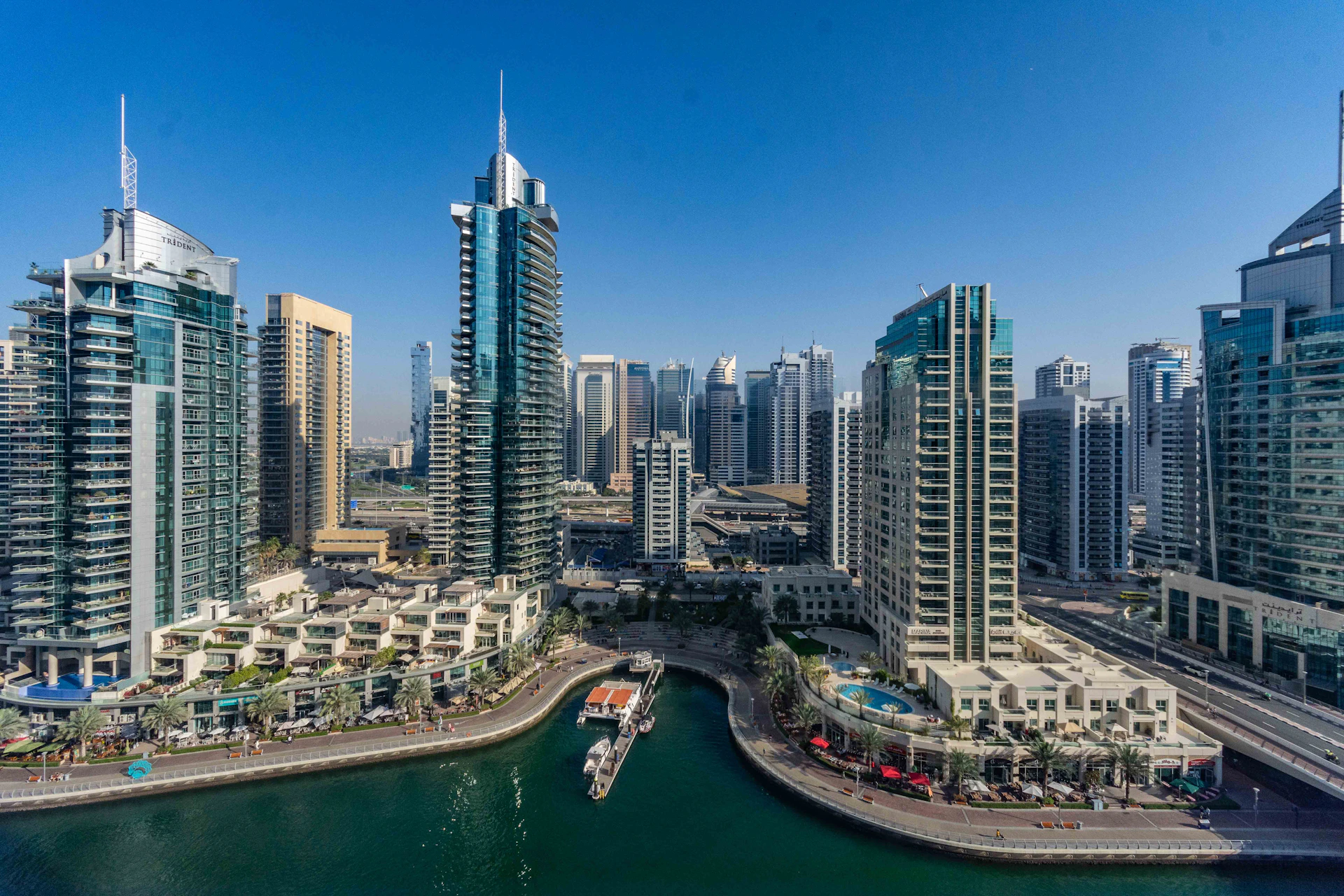 A large body of water surrounded by tall buildings