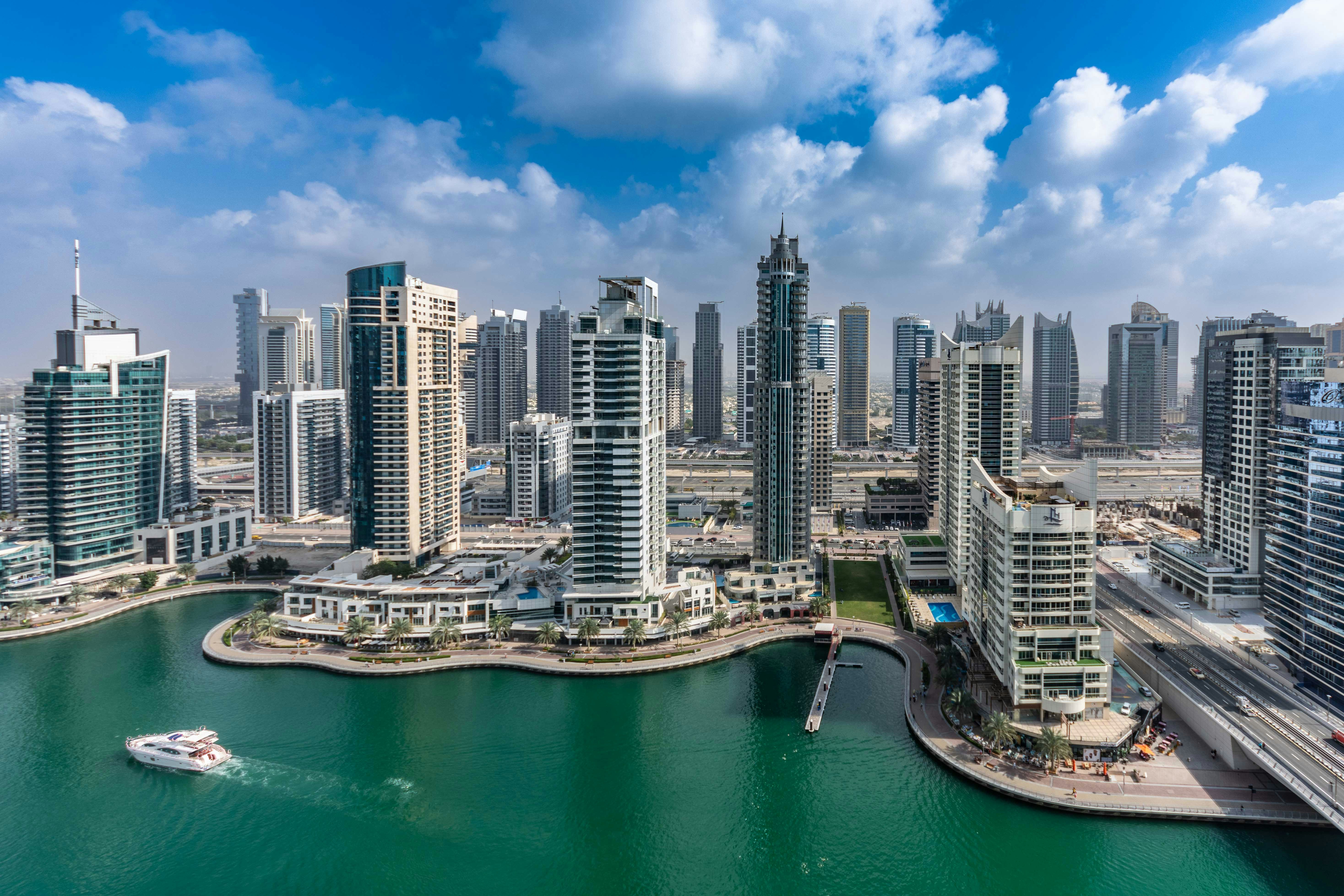 A large body of water surrounded by tall buildings