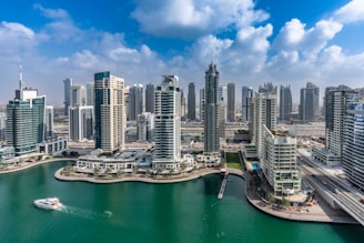 A large body of water surrounded by tall buildings