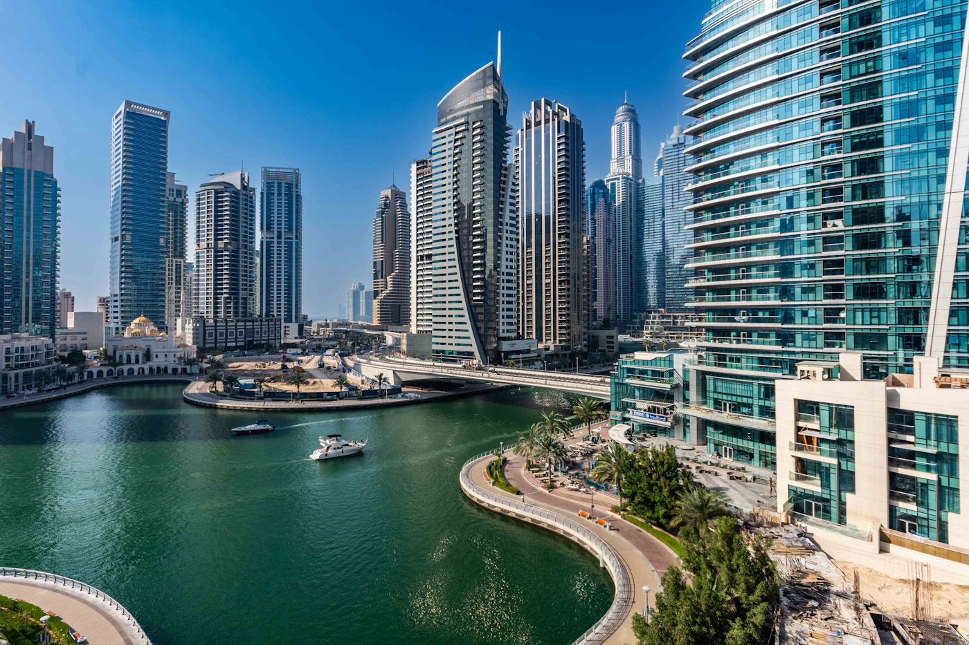 A waterway running between tall buildings in Dubai