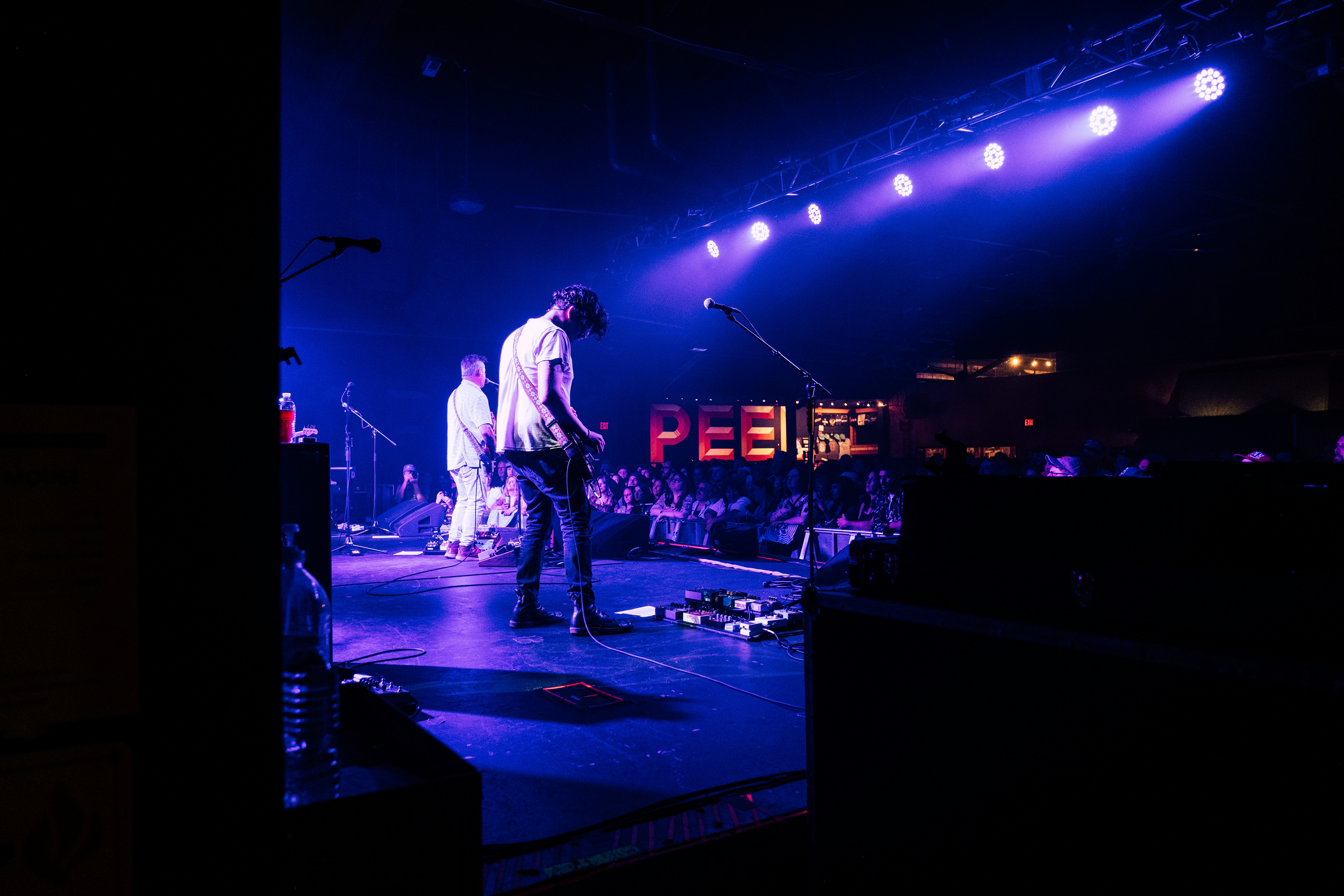 A group of people standing on top of a stage