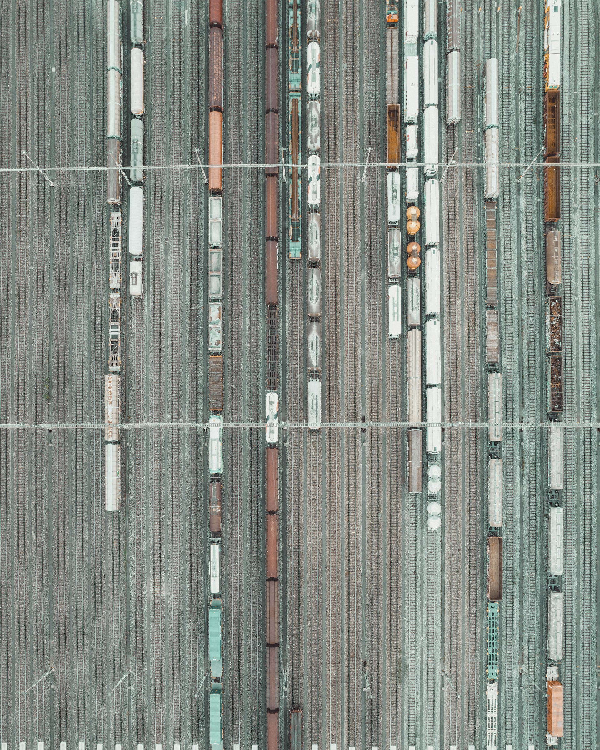 An aerial view of a train yard with trains