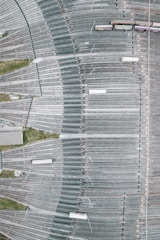 An aerial view of a baseball stadium with a baseball field