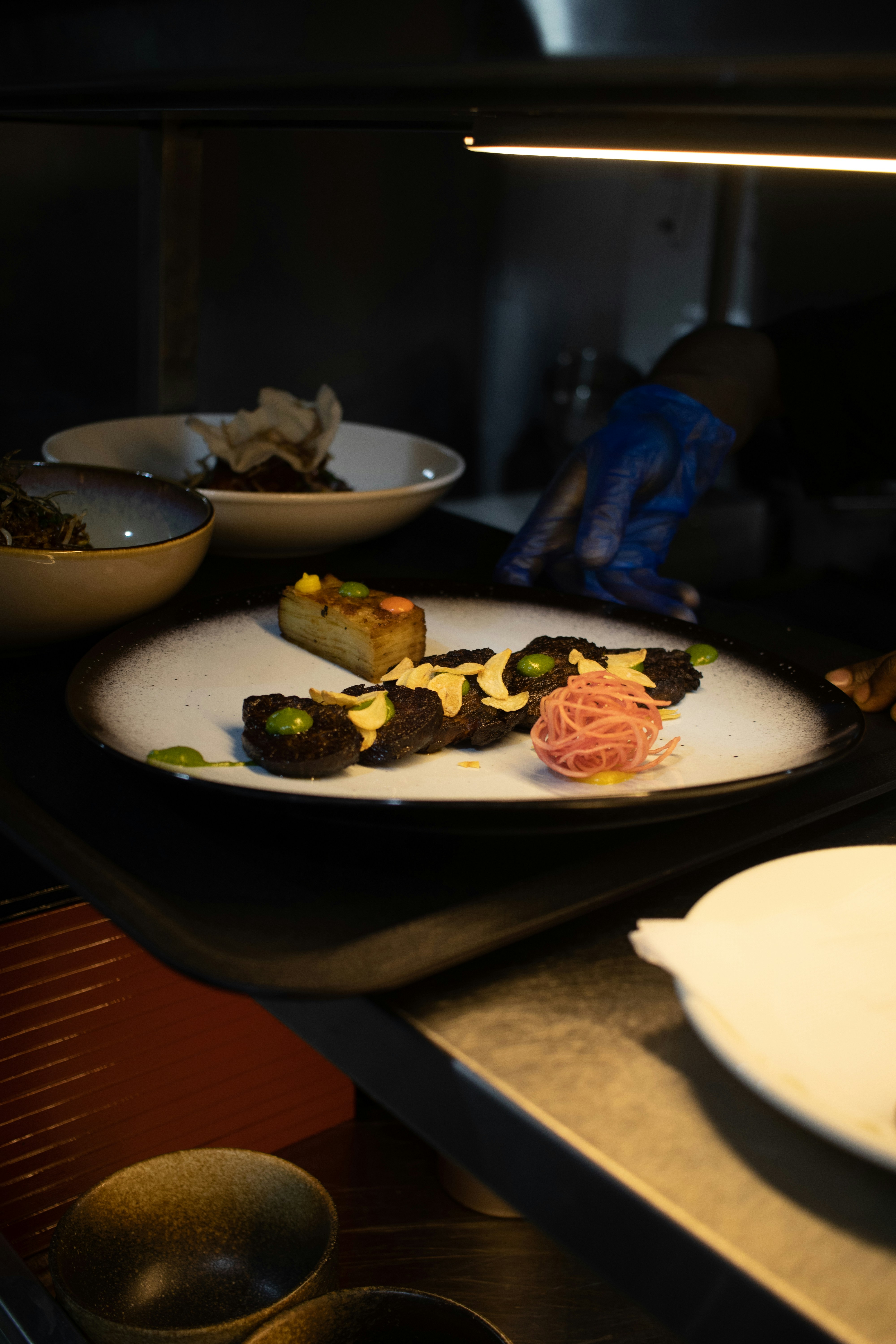A plate of food on a table in a kitchen
