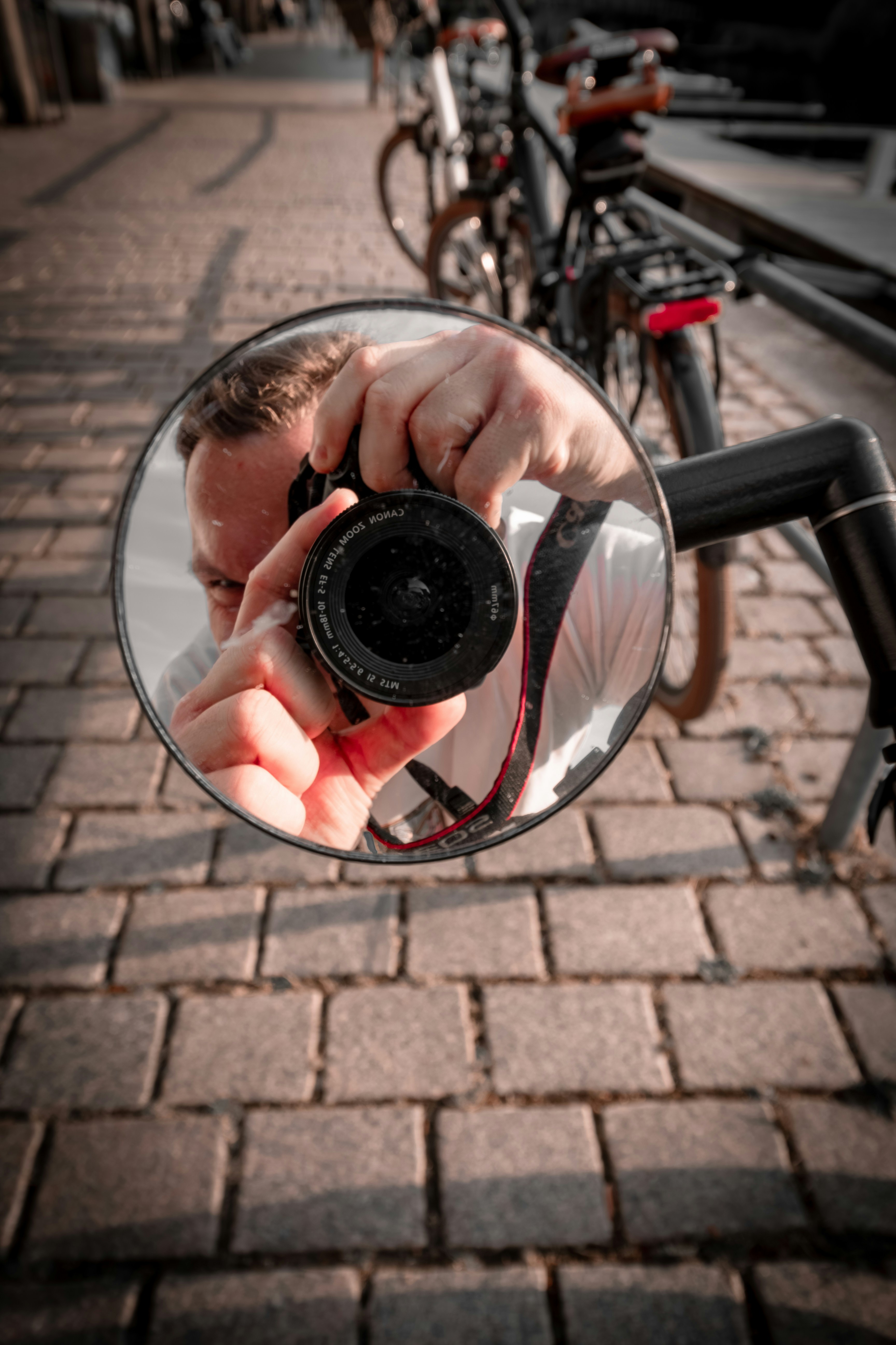 A man taking a selfie in a mirror