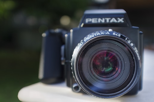 A close up of a camera on a table