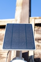 A close up of a street sign with a sky background