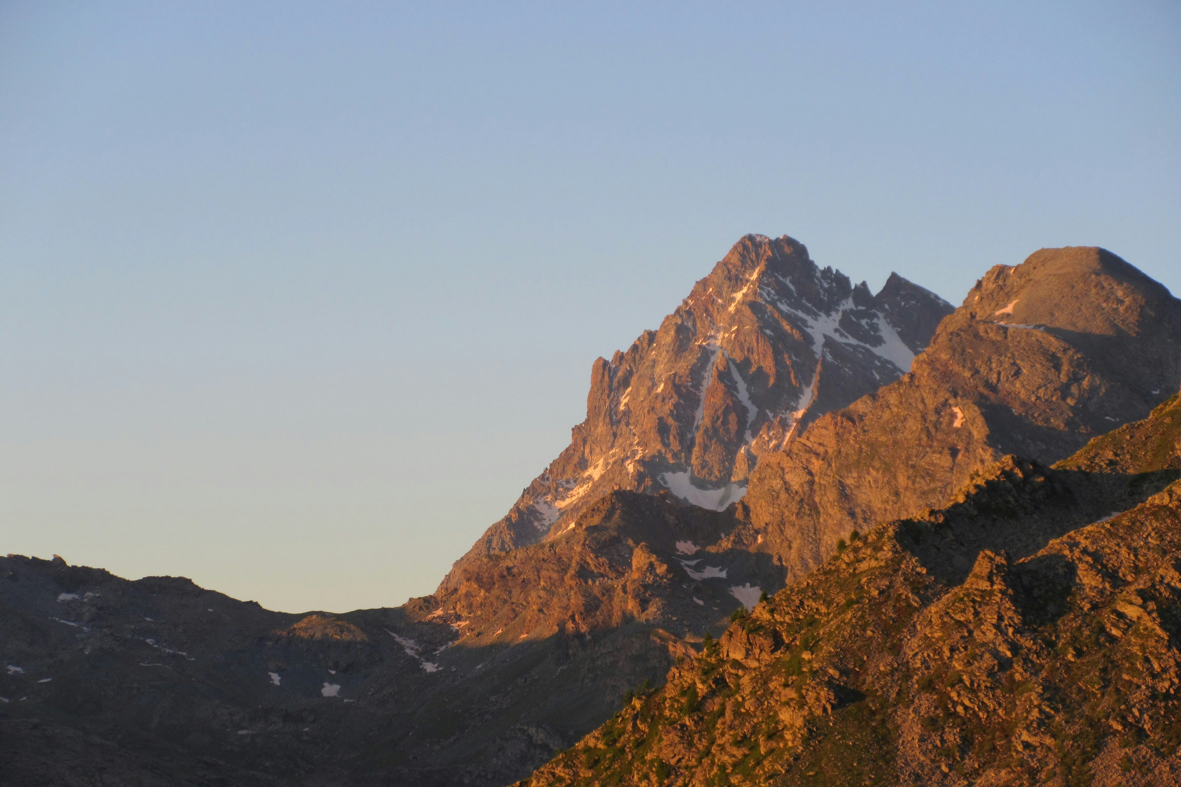 A view of a mountain range at sunset