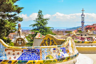 A colorfully painted bench overlooks a city