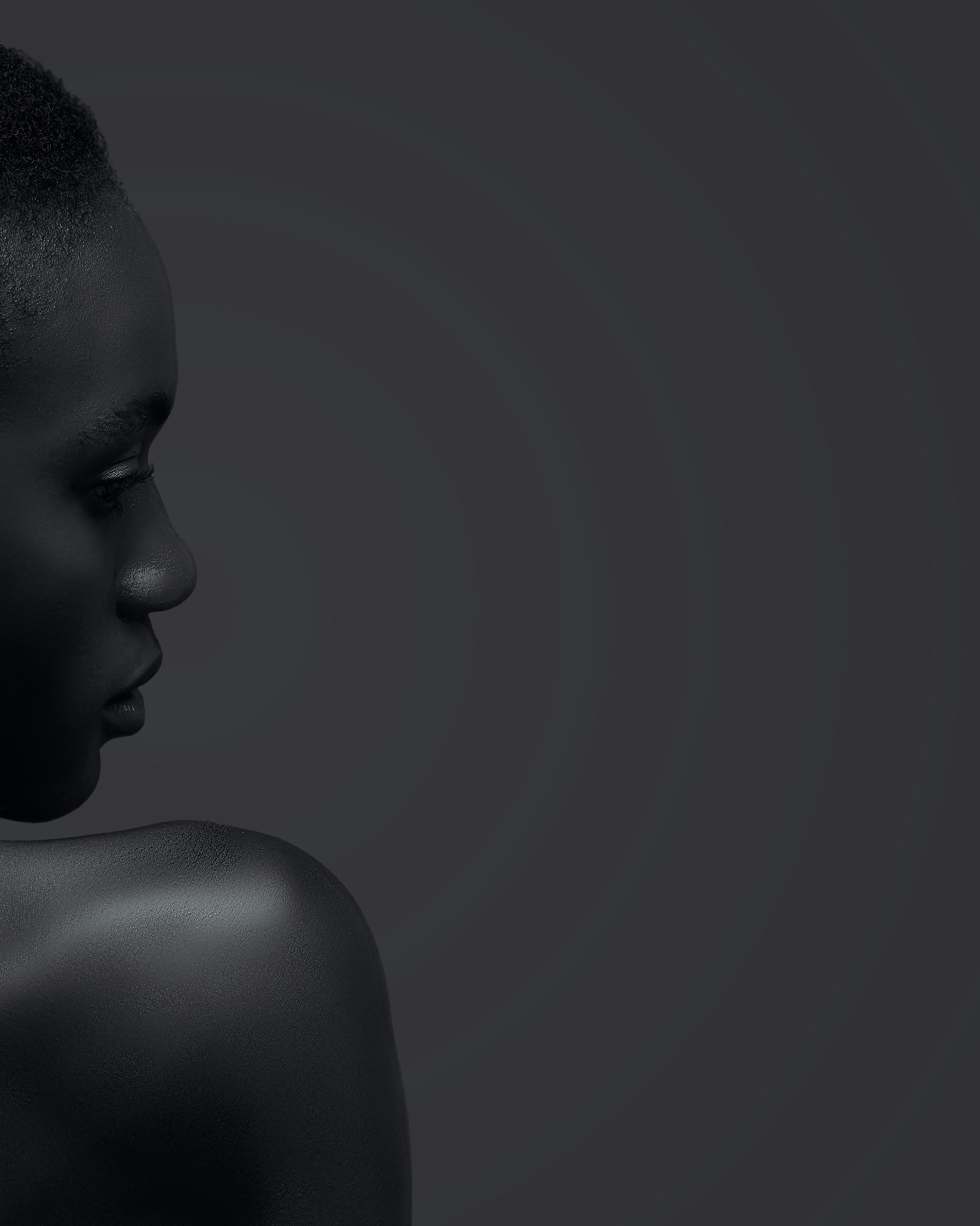 A black woman with a short haircut