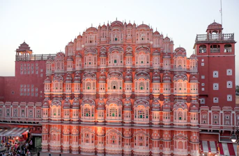 A large building with a lot of windows on top of it