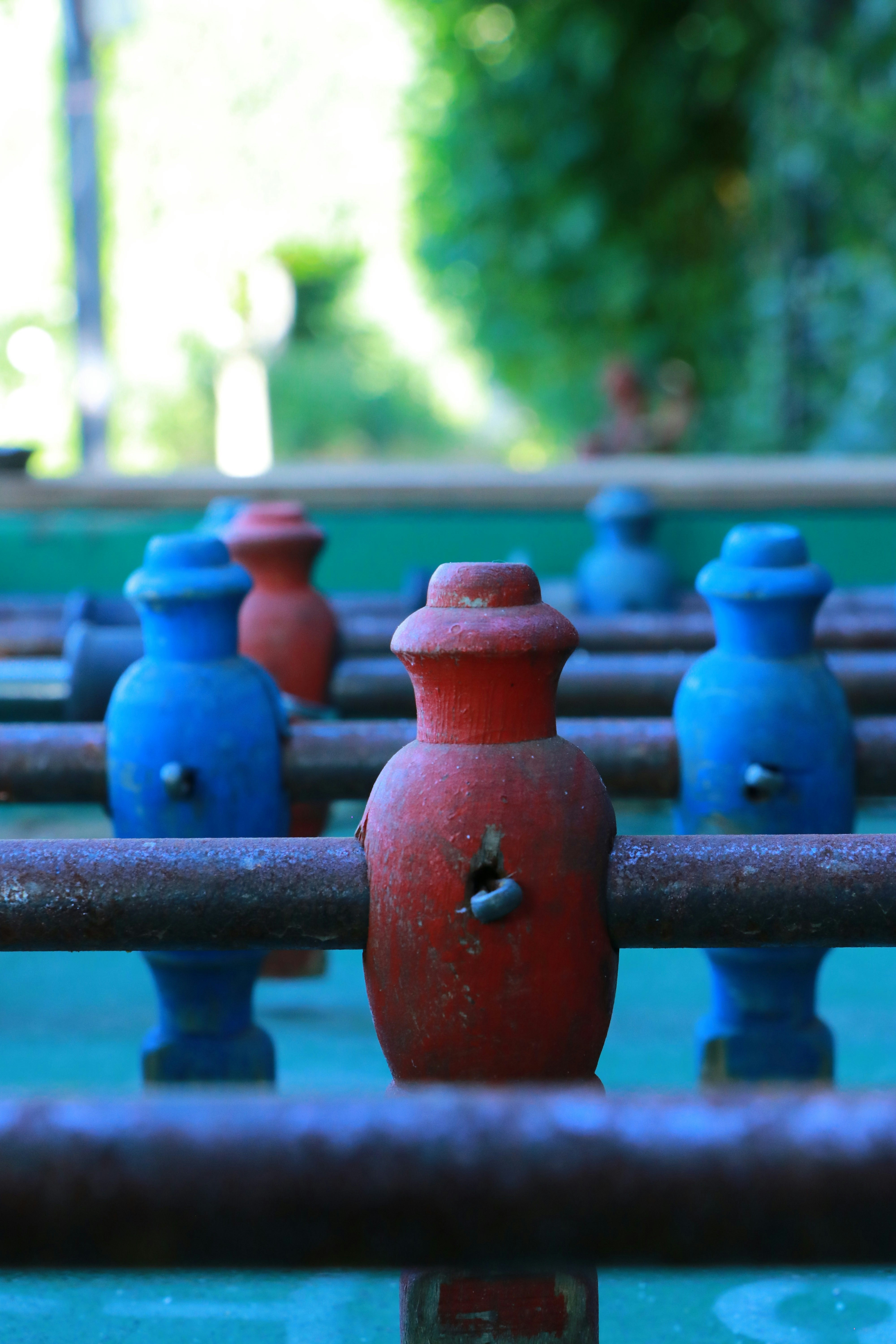 How to Identify and Fix Bottlenecks That Are Slowing Down Your Business Growth – A row of blue and red vases sitting on top of a metal rack
