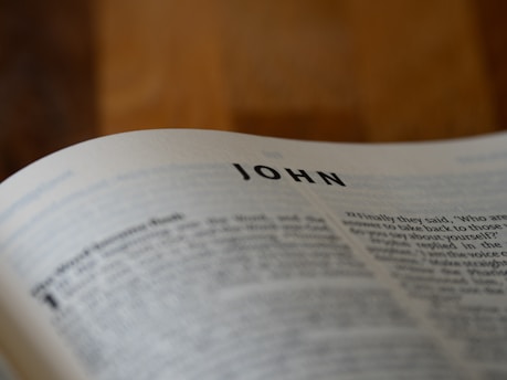 A close up of an open book on a table