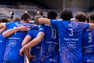 A group of young men standing next to each other