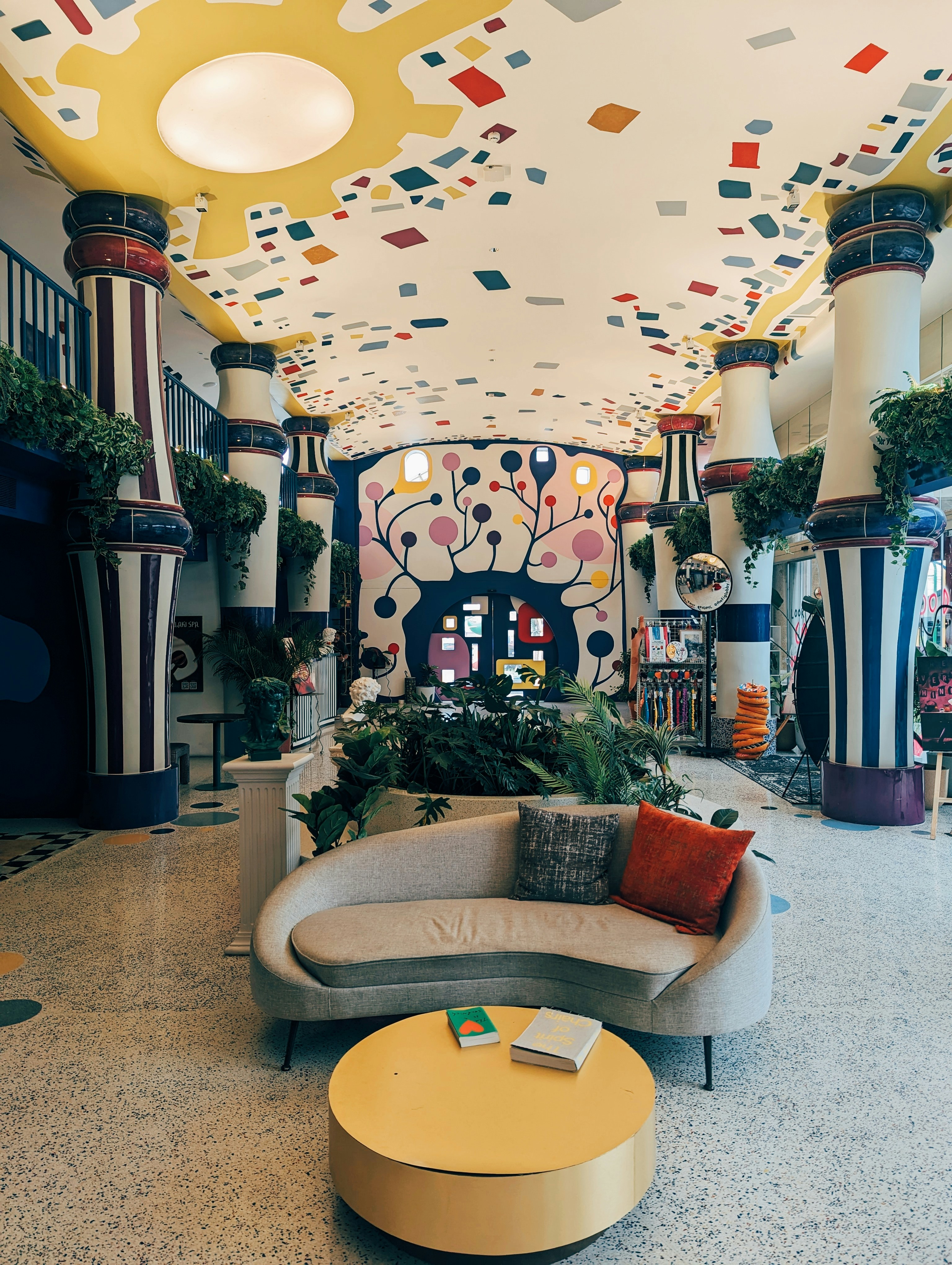 A room with a couch and a table in it