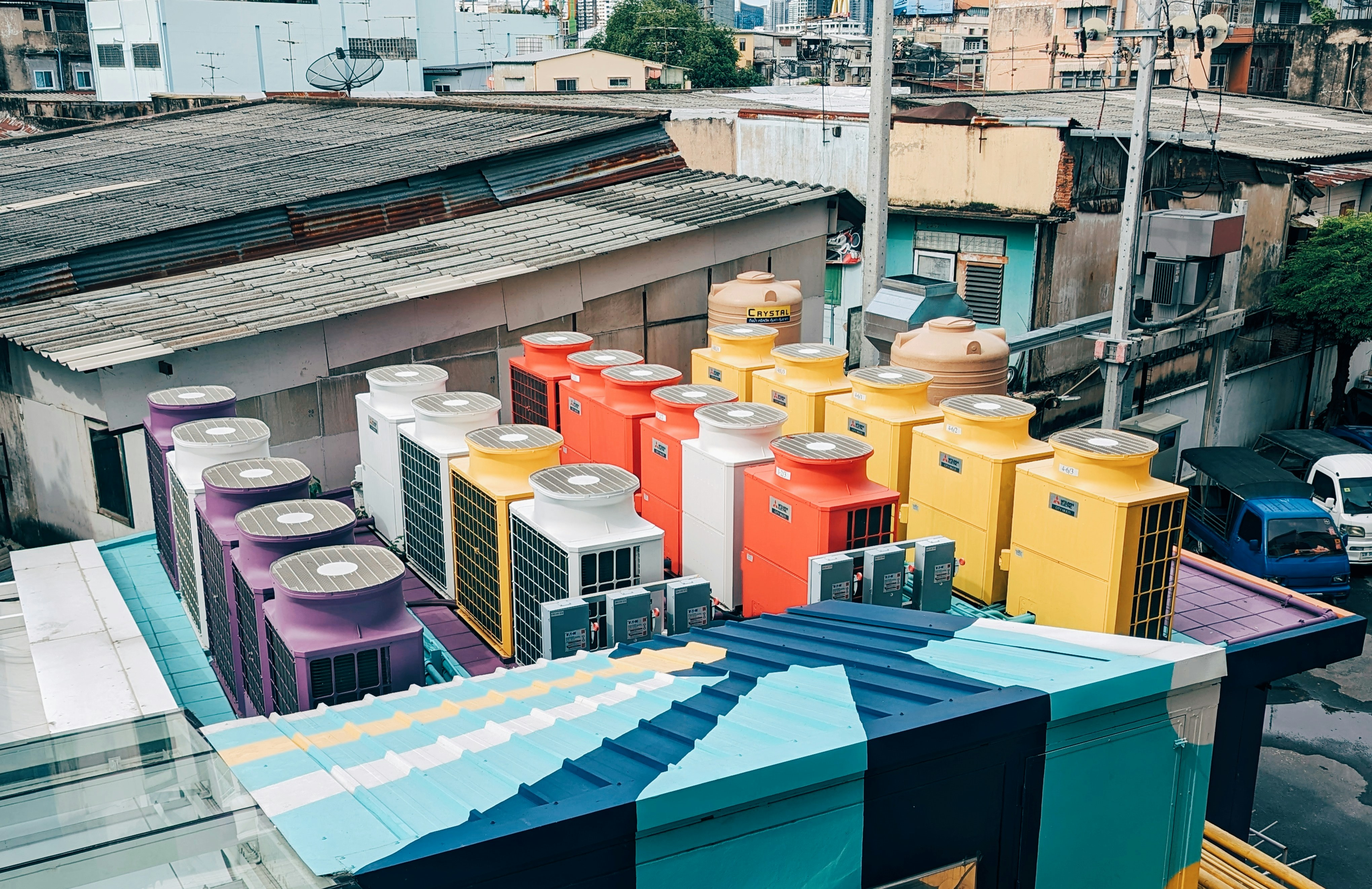 A bunch of colorful boxes sitting on top of a roof