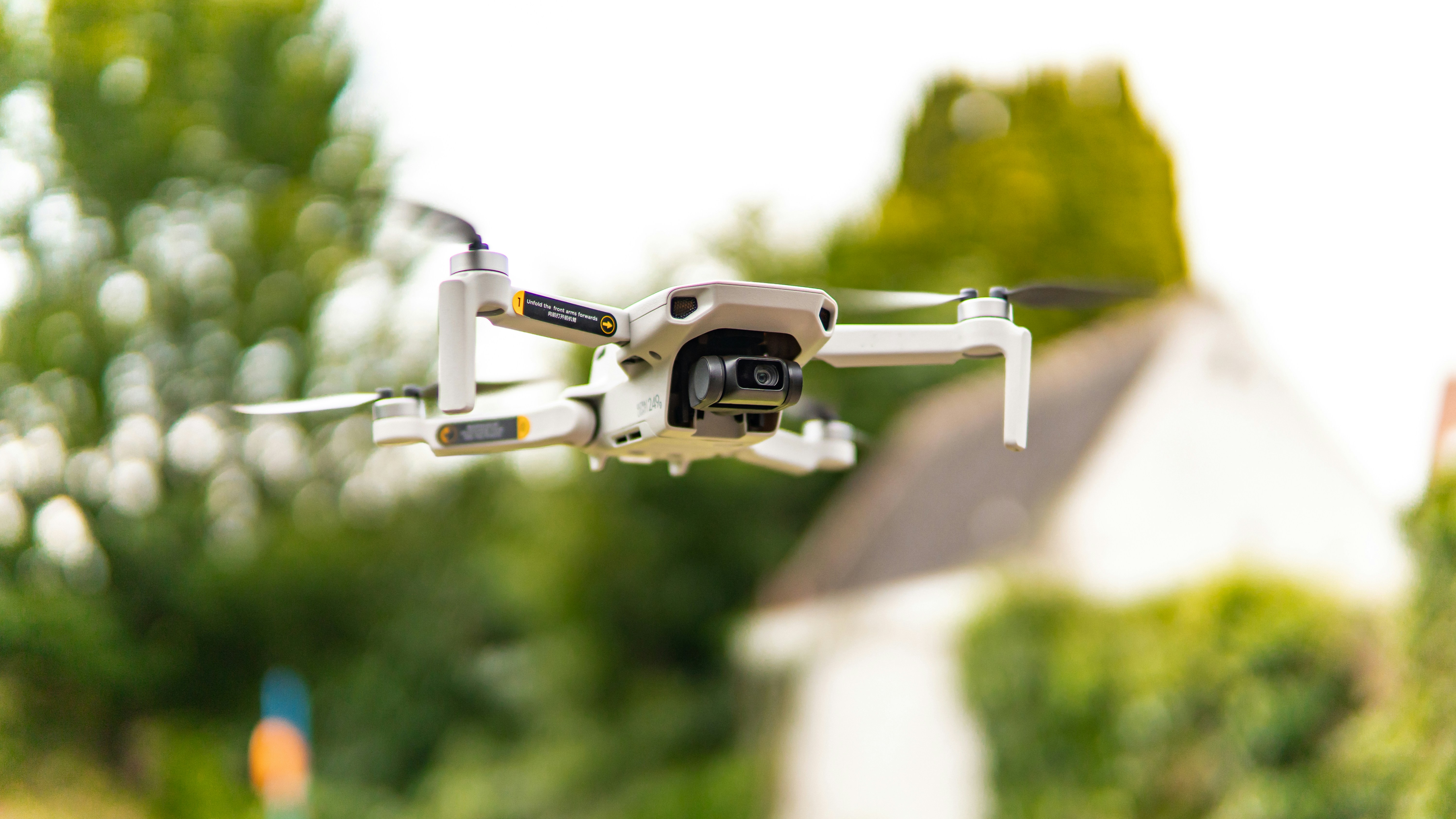 A camera attached to the side of a building