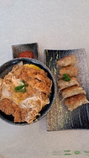 A bowl of food sitting on top of a table