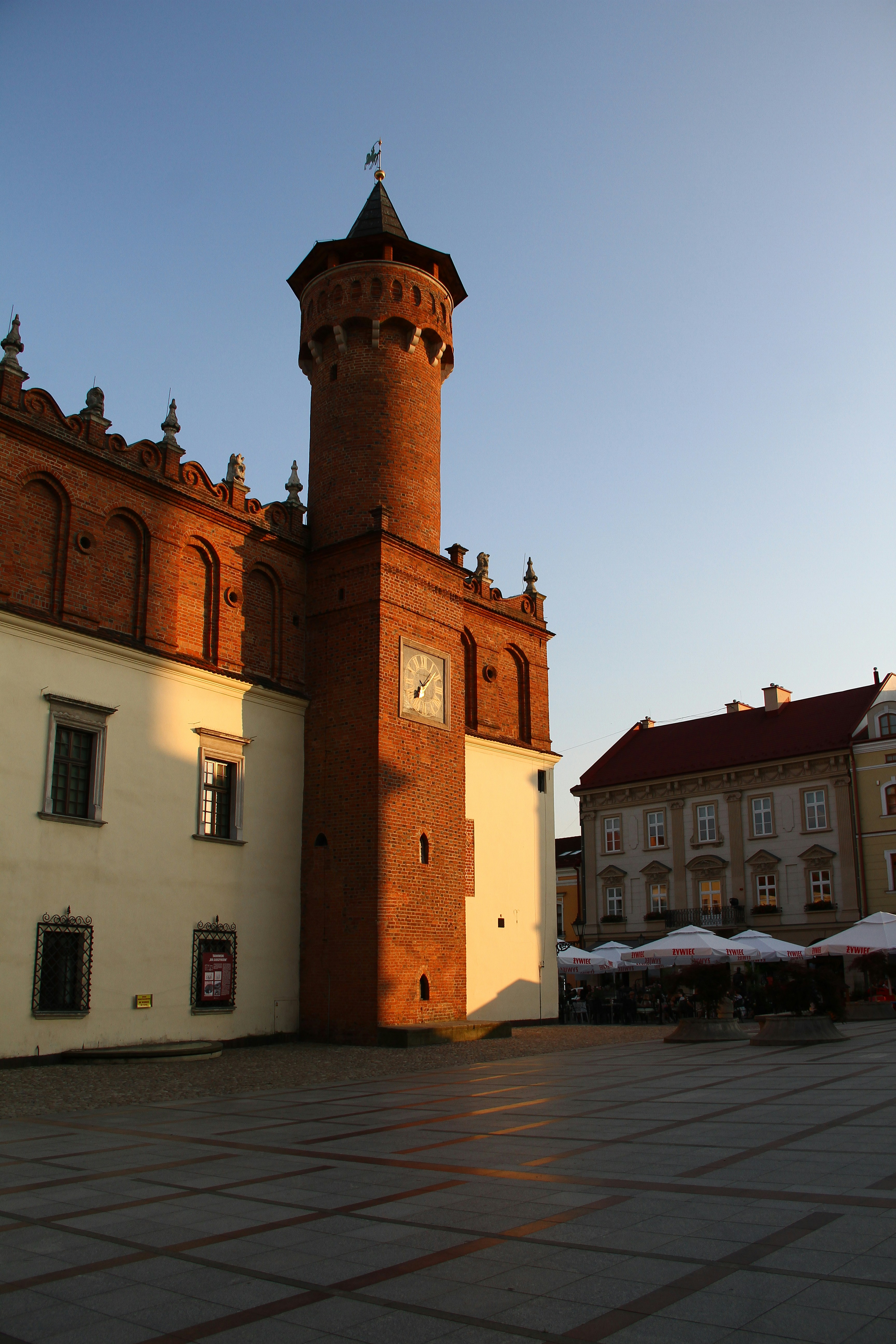 A large brick building with a clock tower