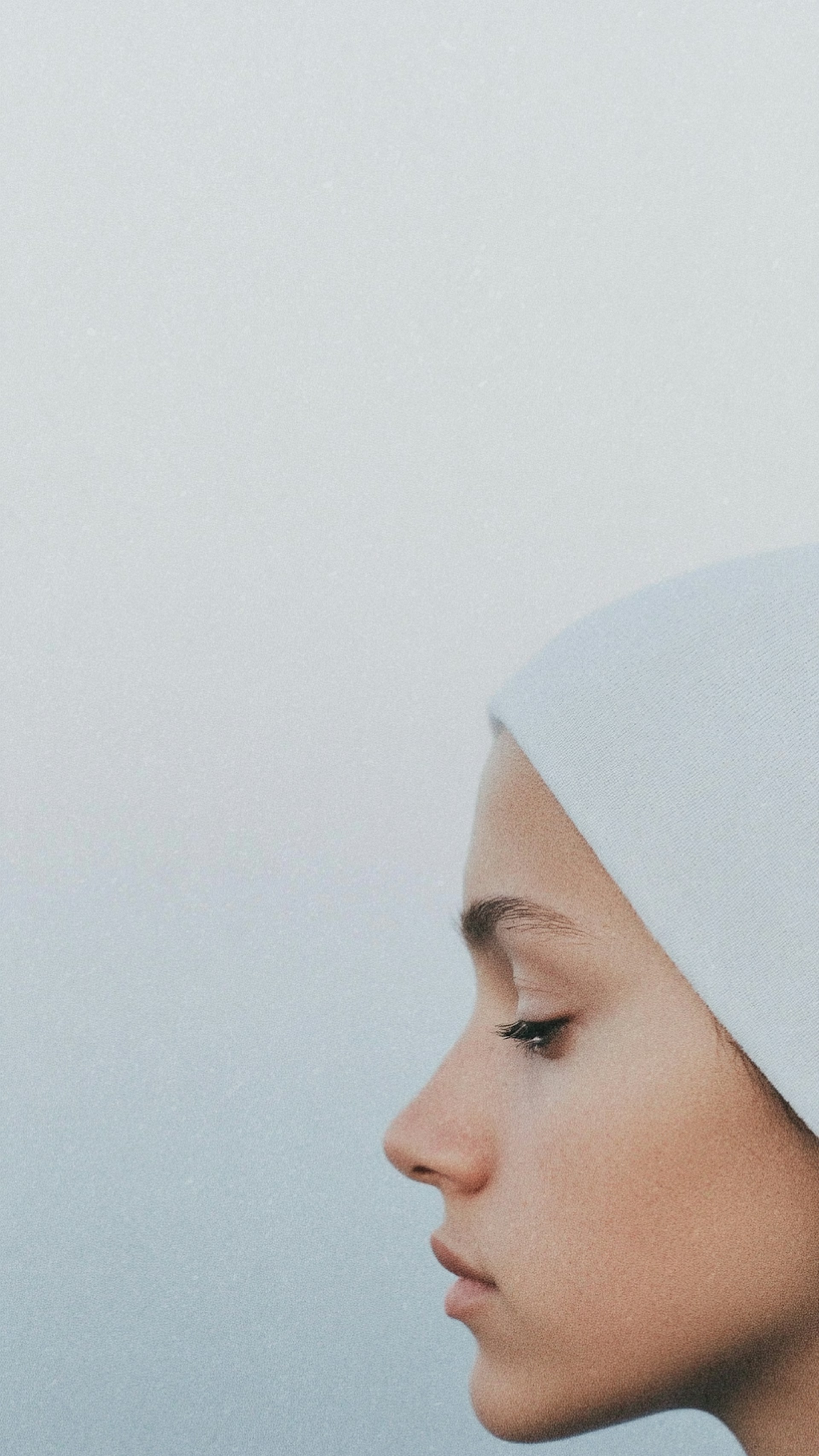 A woman with a white hat on her head