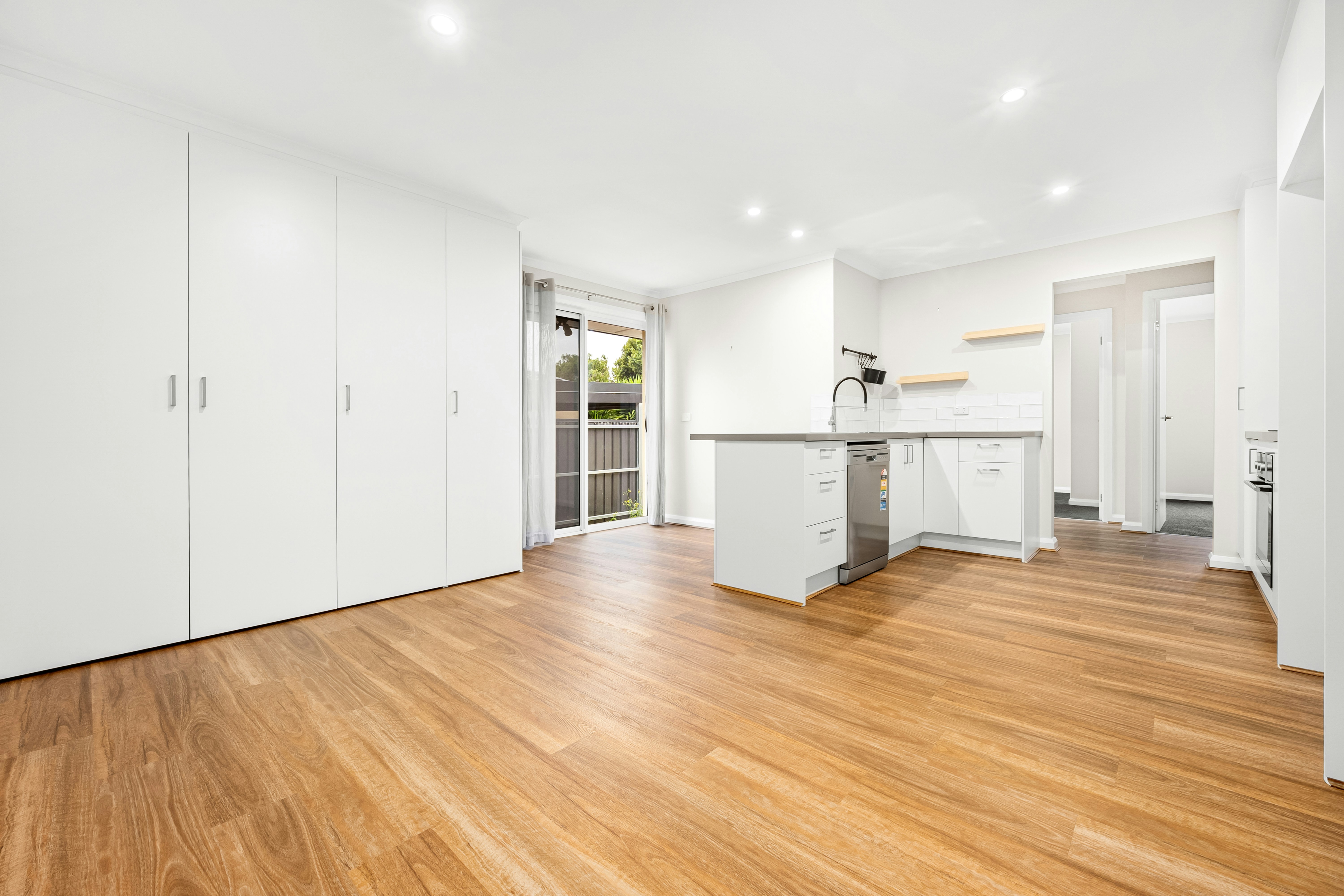 Kitchen flooring installation with modern wooden finish
