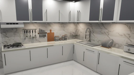 A kitchen with white cabinets and marble counter tops