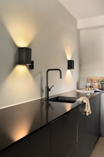 A kitchen with a sink and a window