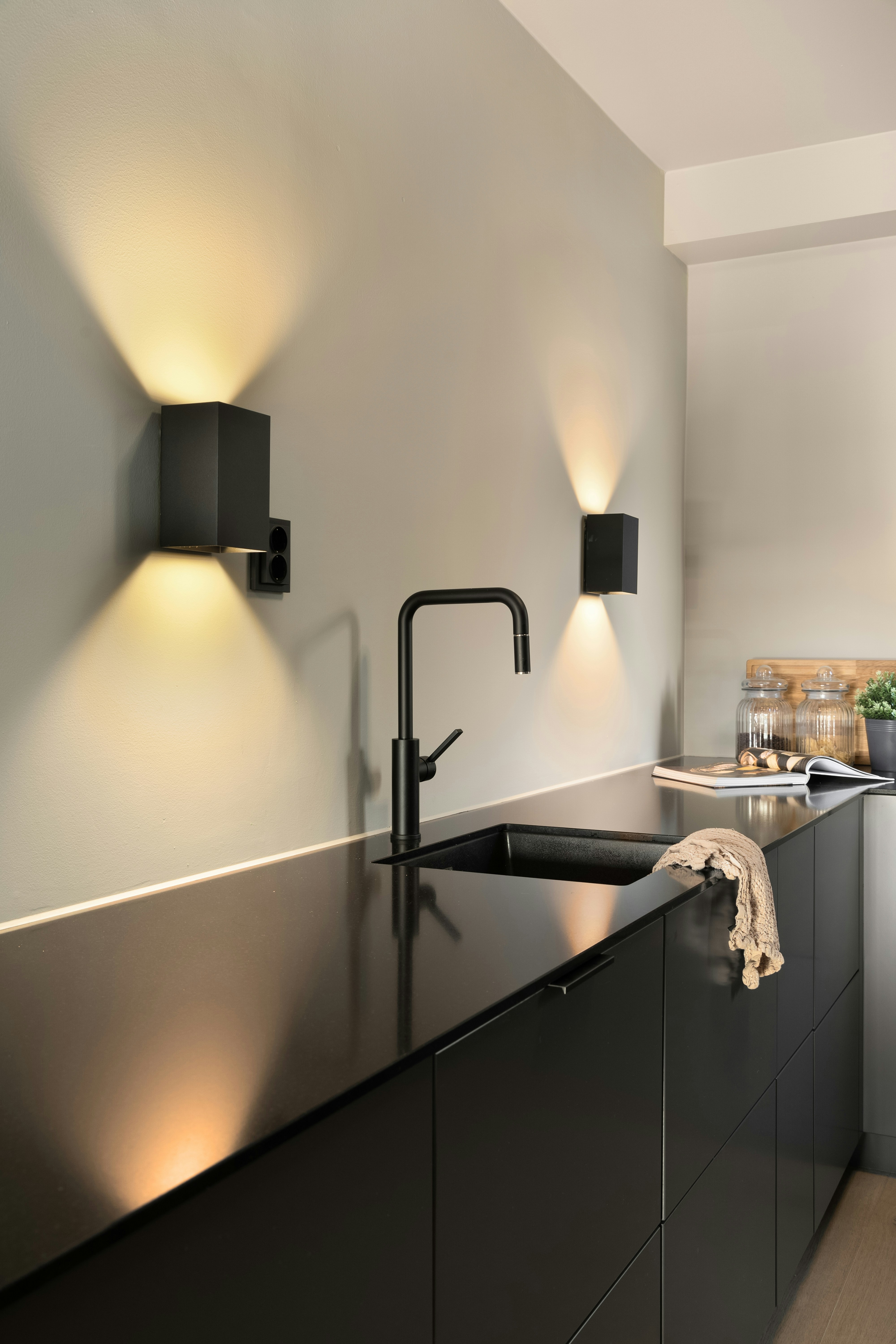 A kitchen with a sink and a window