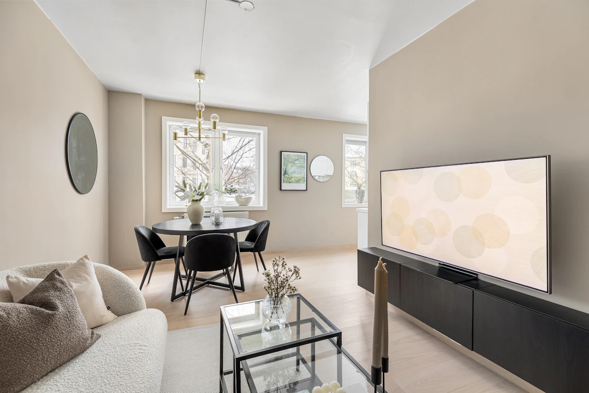 Living space with a television and fitted furniture