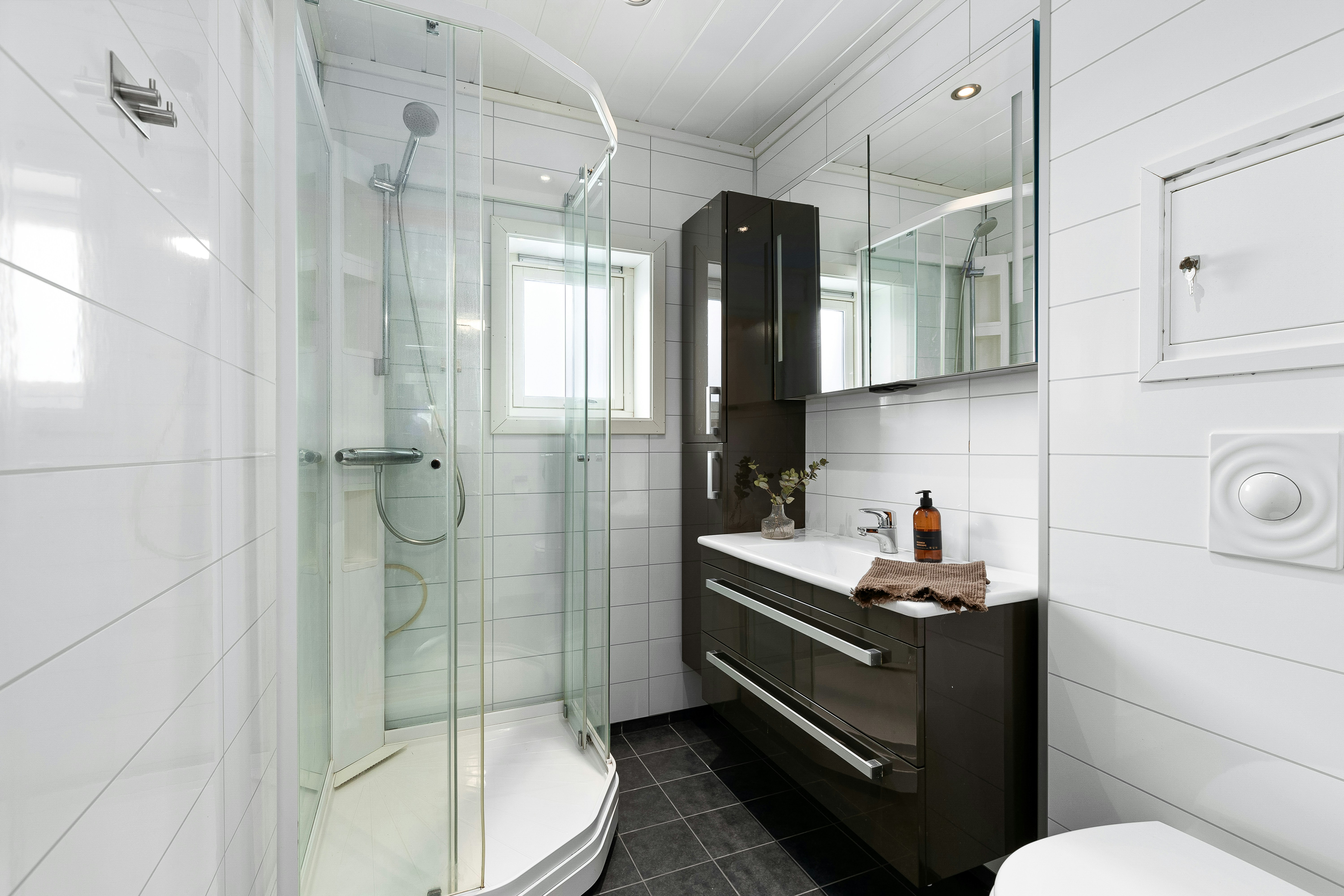 Modern spacious bathroom with freestanding tub and walk-in shower
