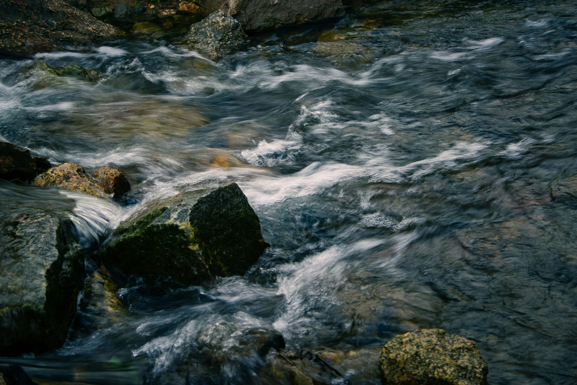 A river with rocks and water running through it