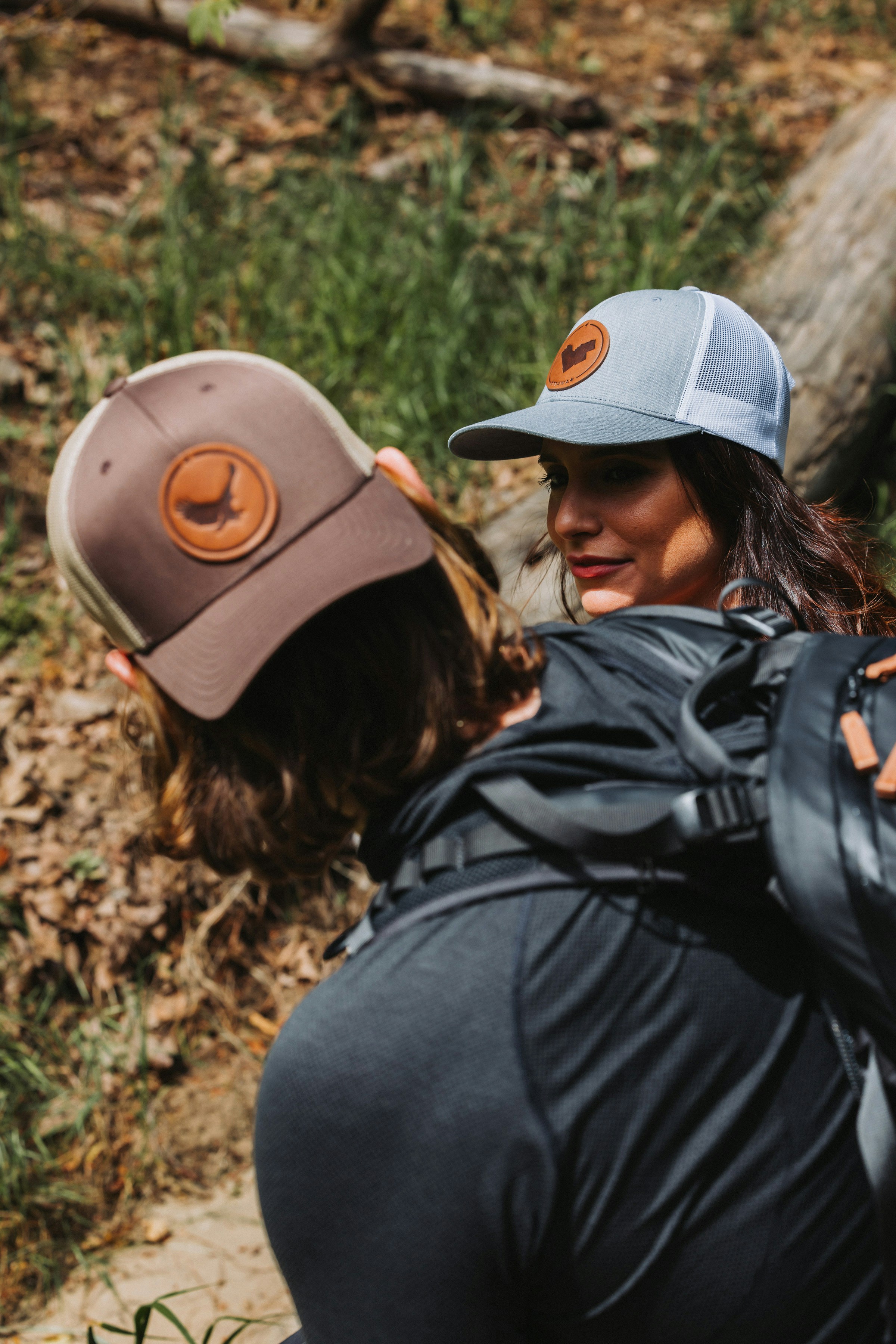 A couple of women standing next to each other