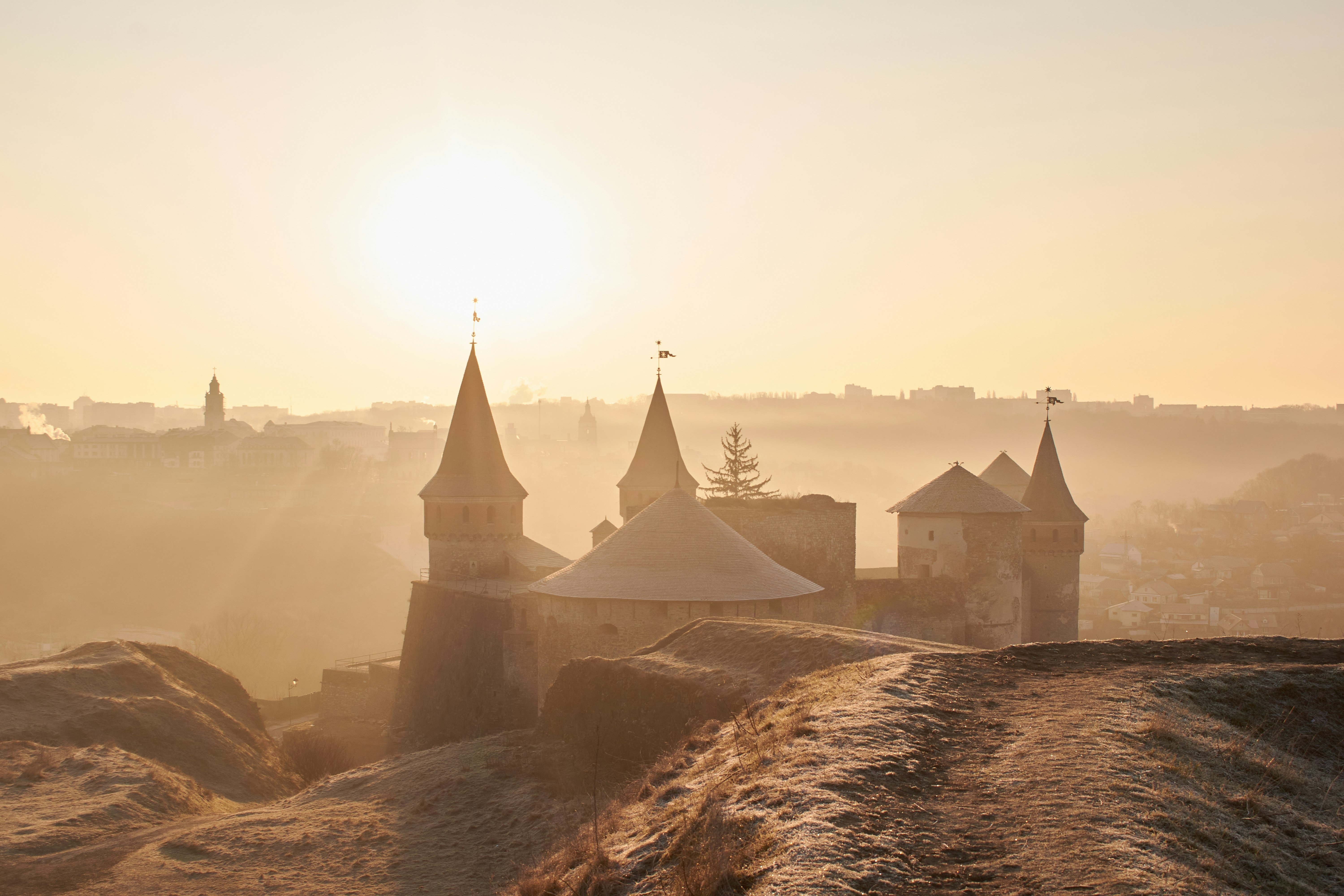 The sun is setting over a small town