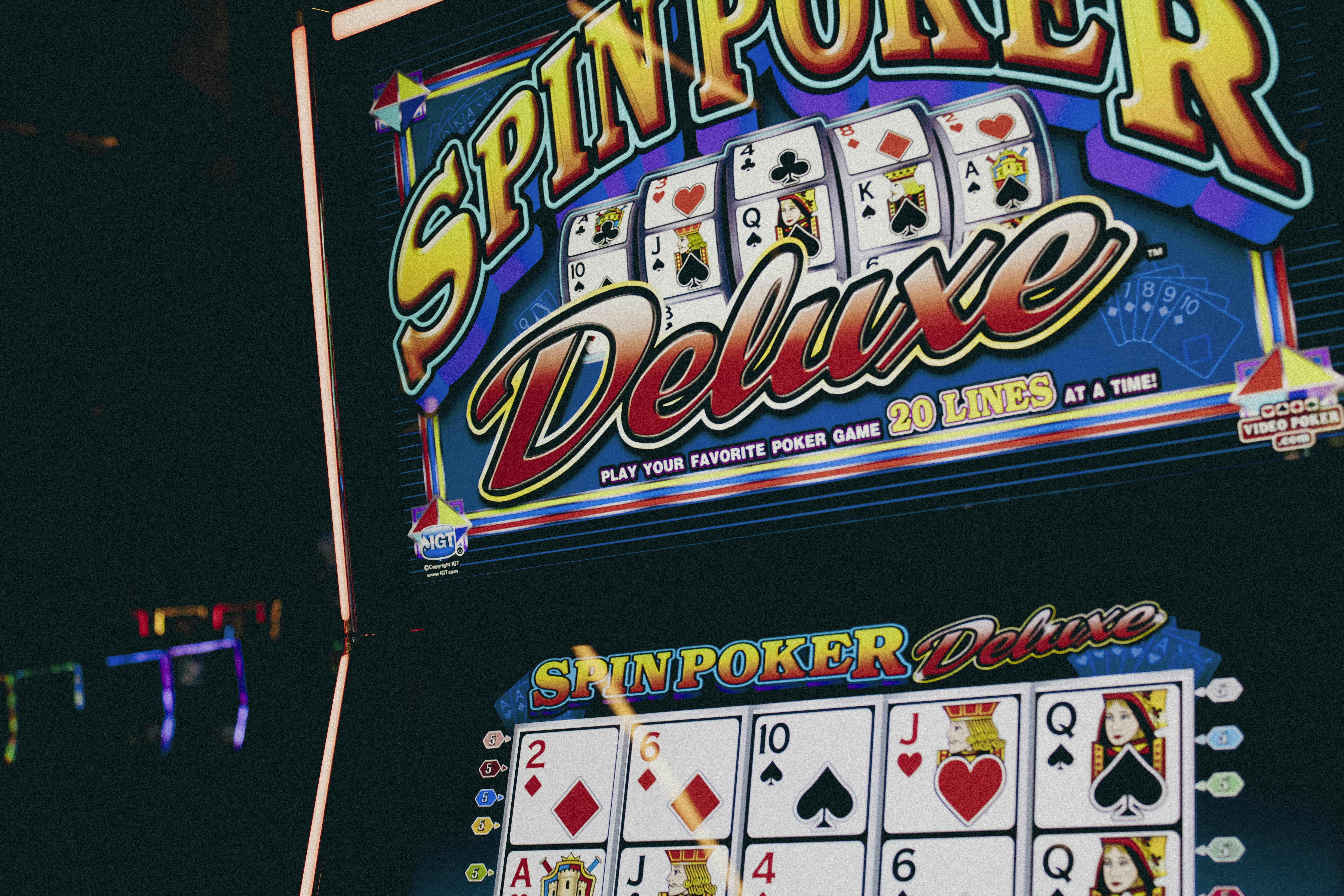 A casino machine with a slot machine next to it