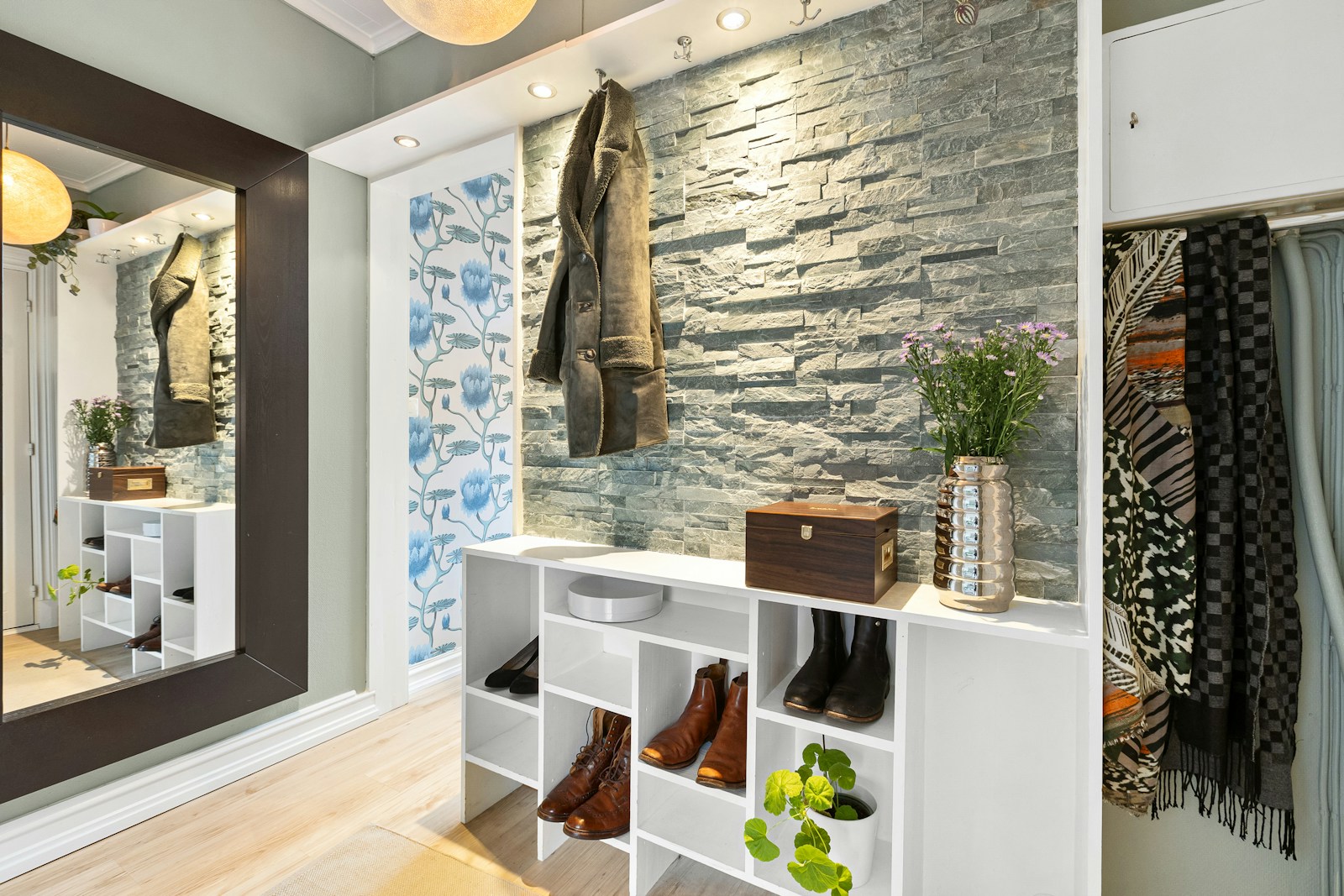 apartment entry zone with shoe shelf coat hook and small mirror