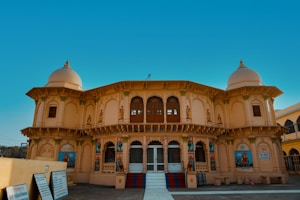 A large building with a clock on the front of it
