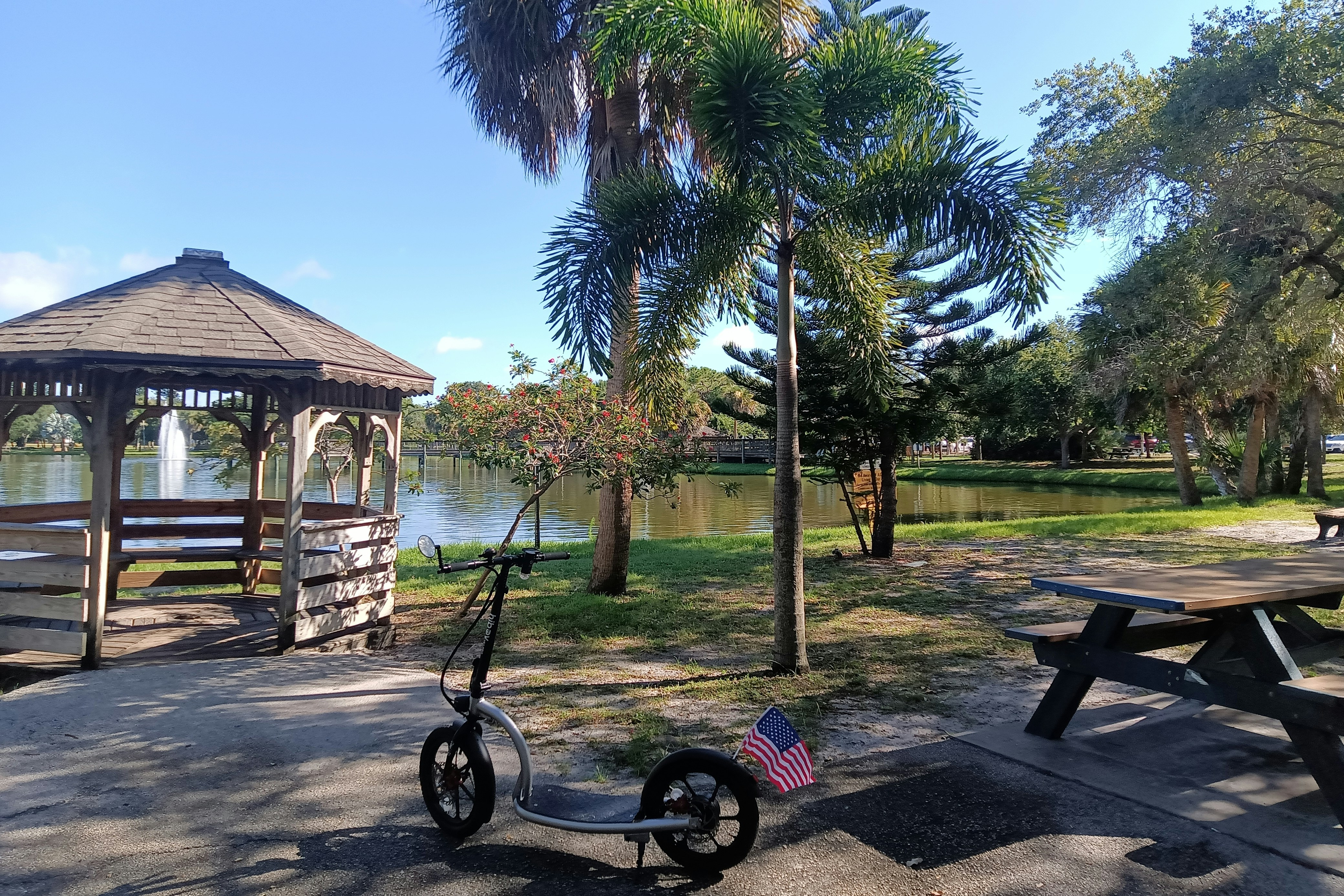 Gazebo and picnic tables beside a lake