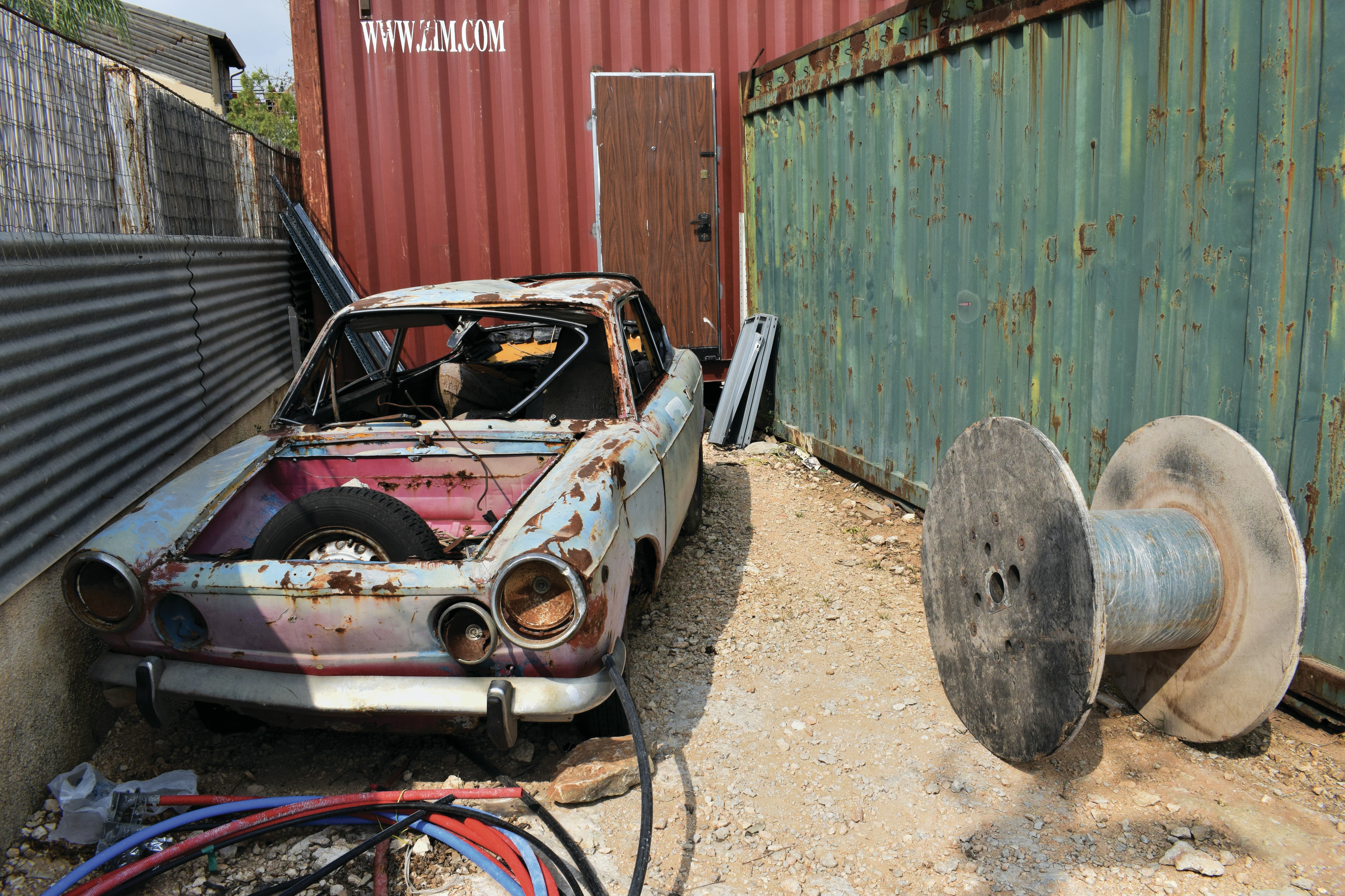 Old car in junkyard