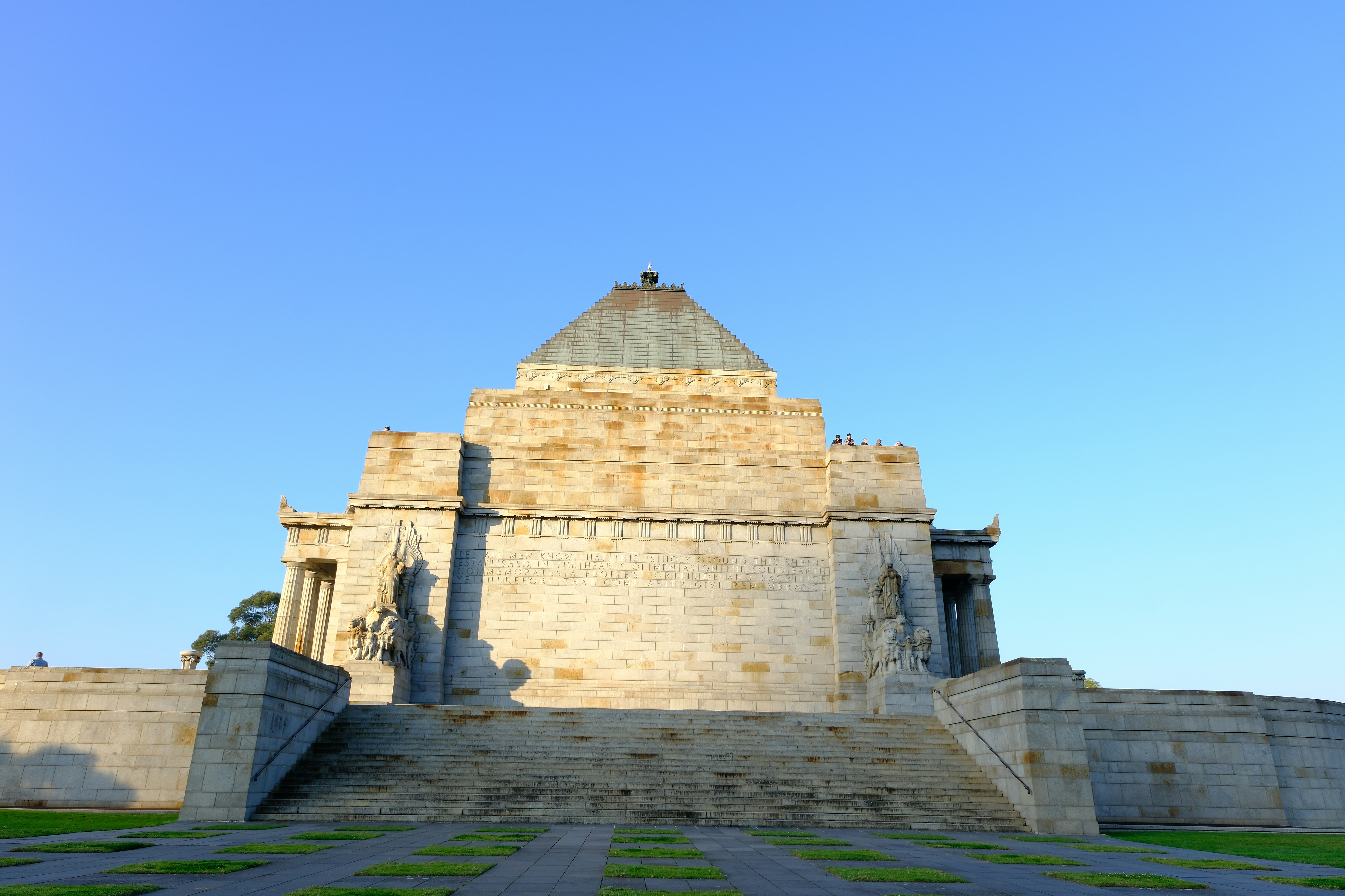 A very tall building with stairs leading up to it