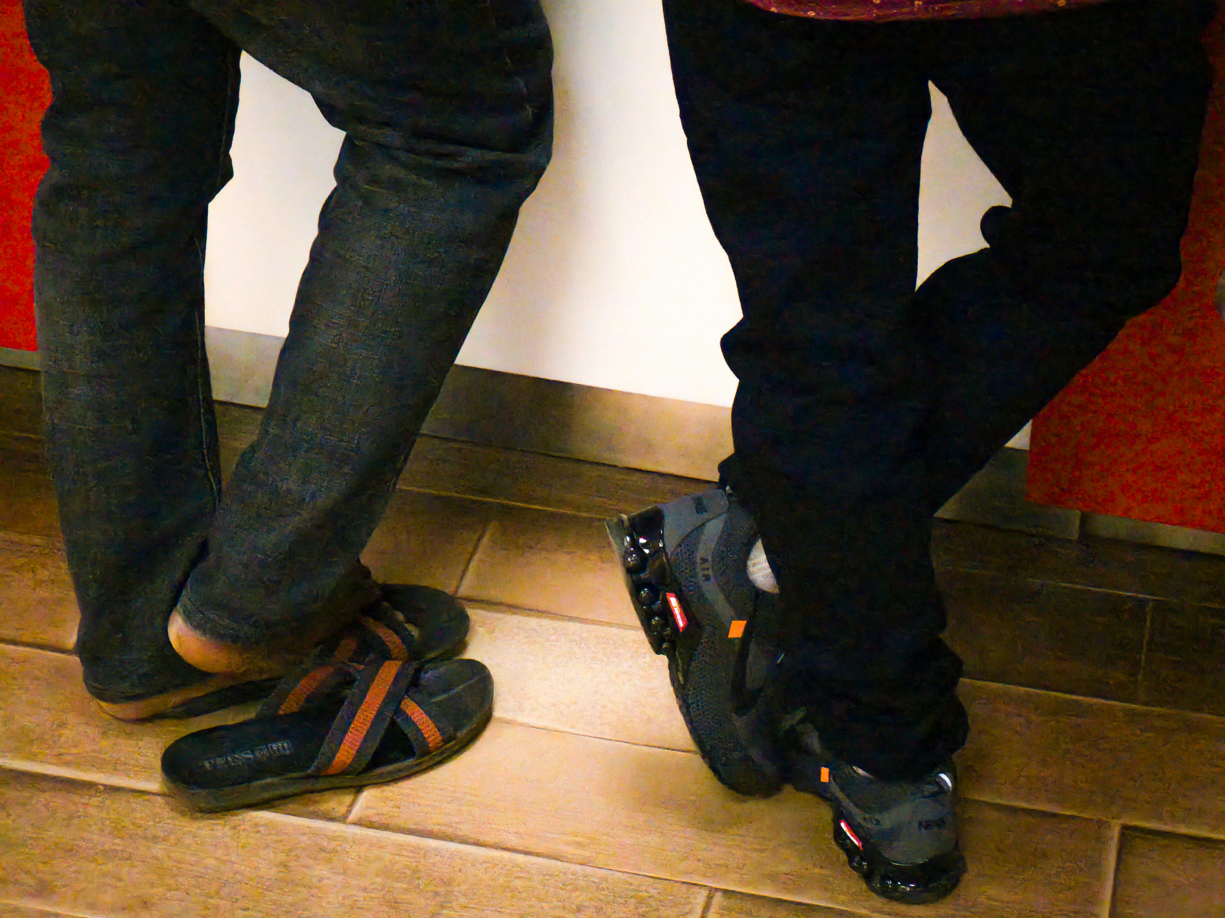 A couple of people standing next to each other