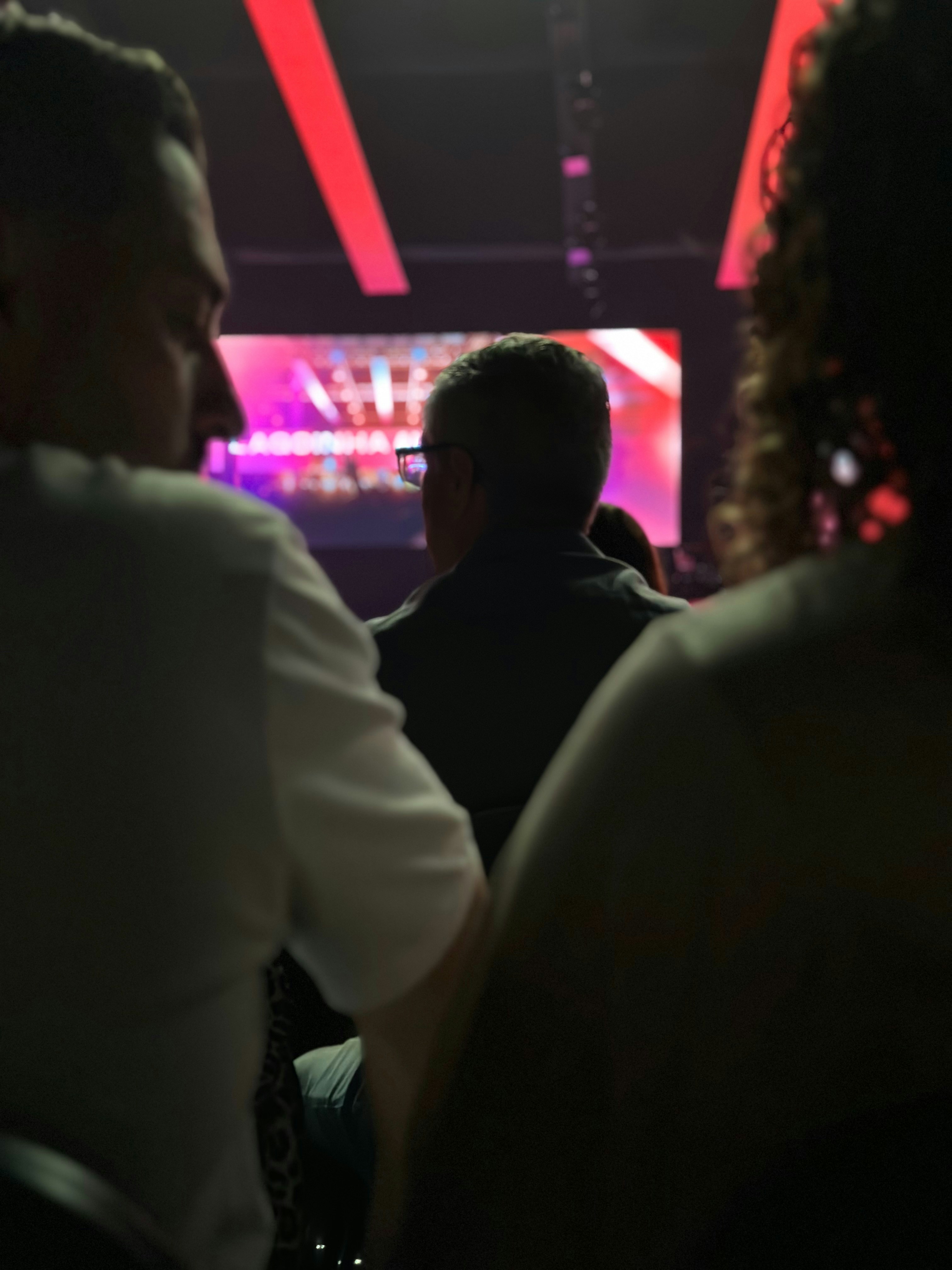 A group of people sitting in a room