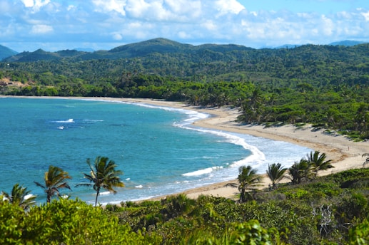 A view of a beach with a boat in the water
