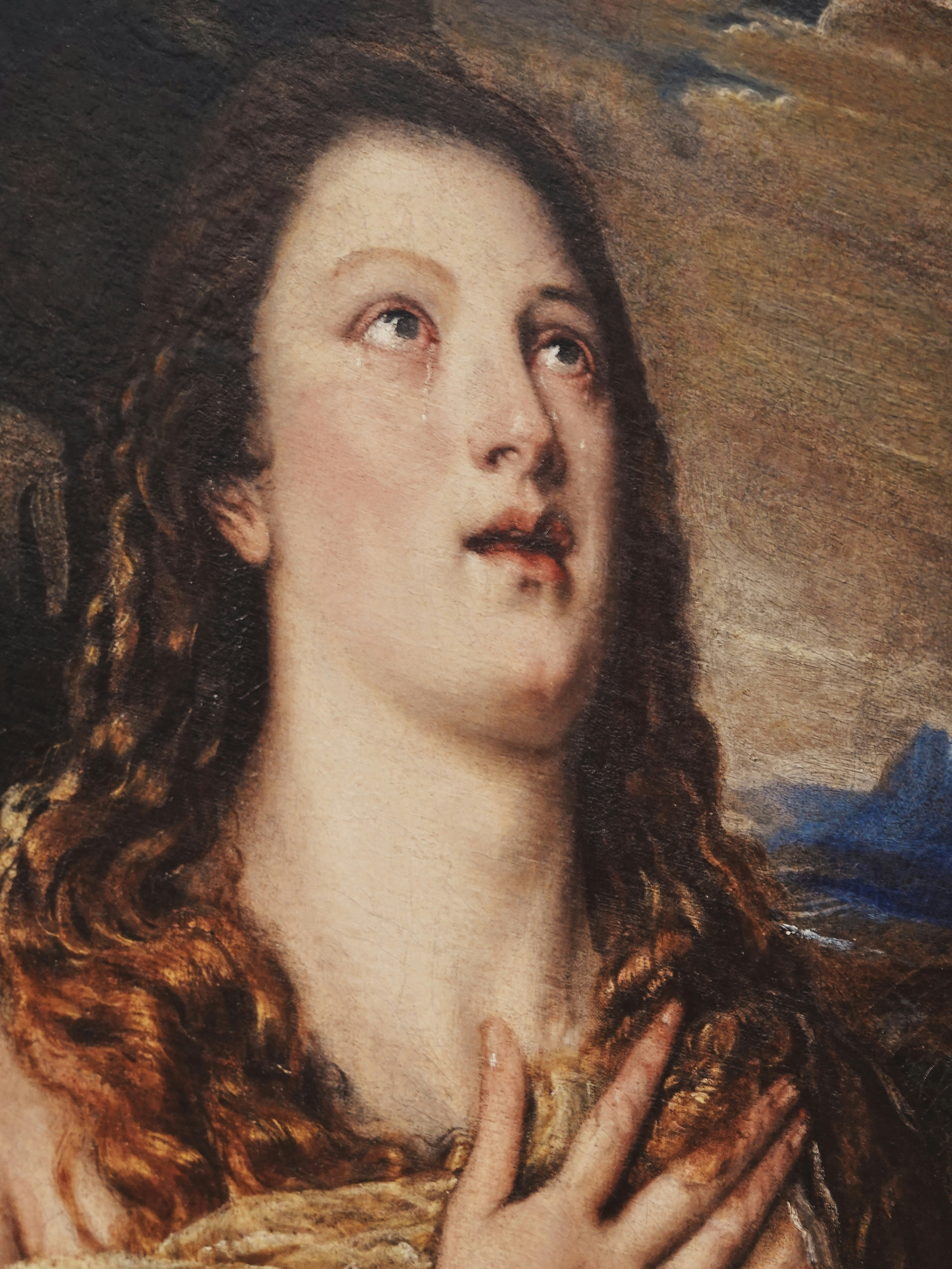 A painting of a woman with long hair